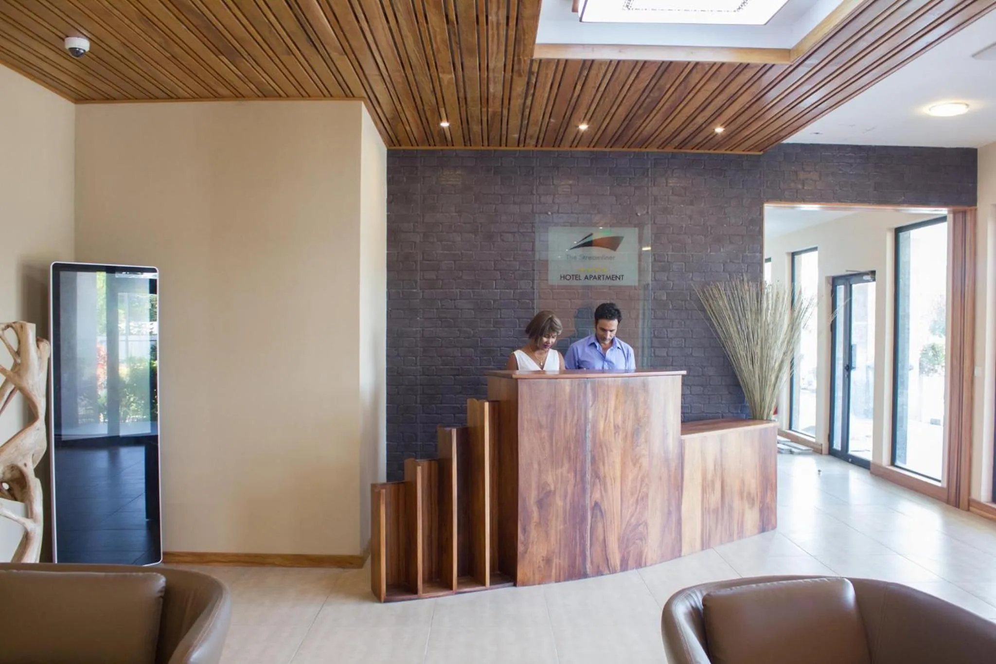 Lobby or reception in The Streamliner Hotel Apartment
