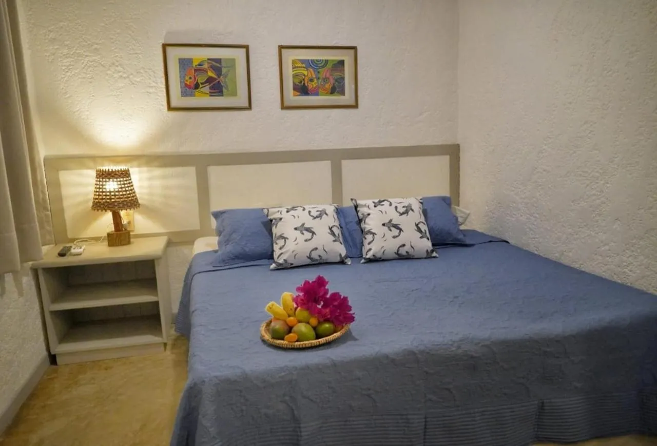 Bed in Pousada Peixe Galo