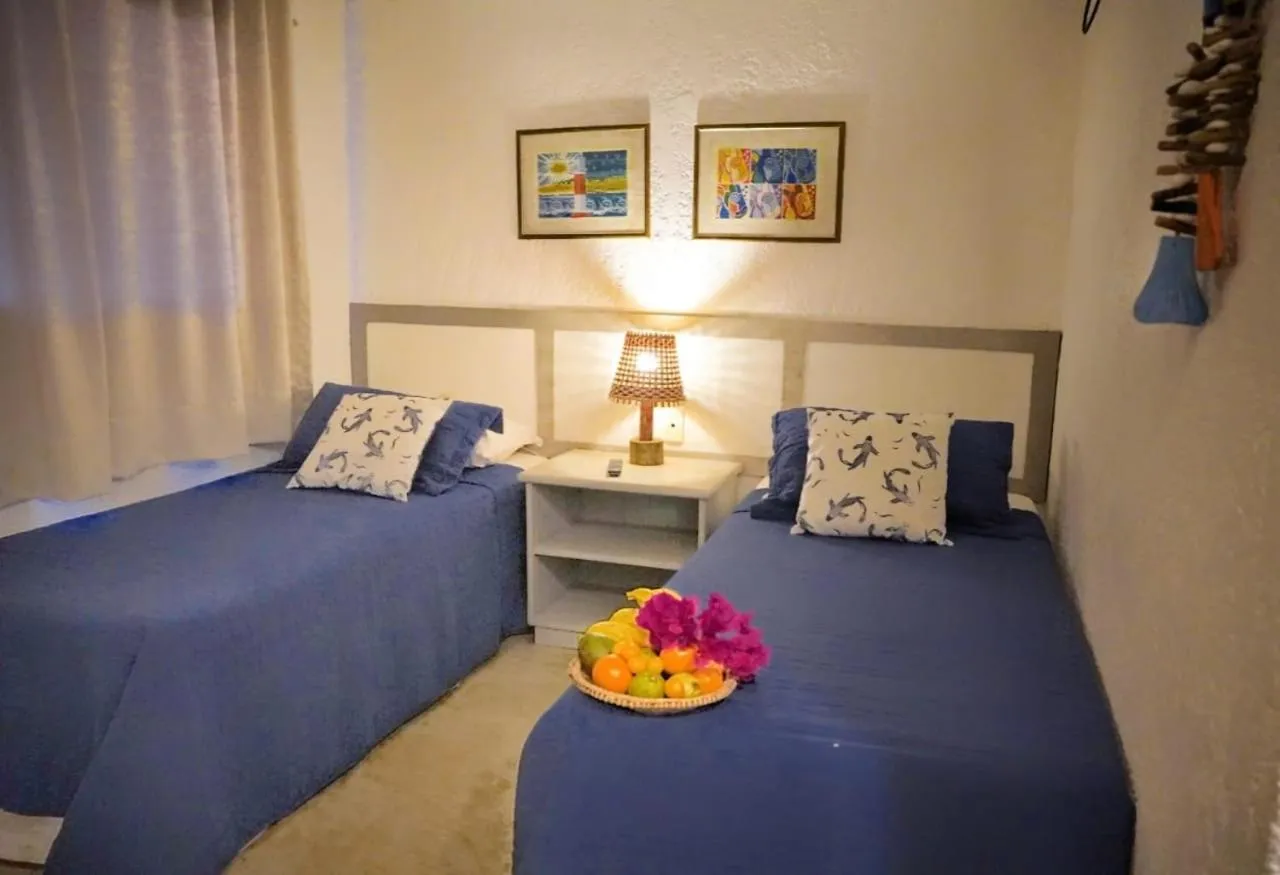 Bed in Pousada Peixe Galo