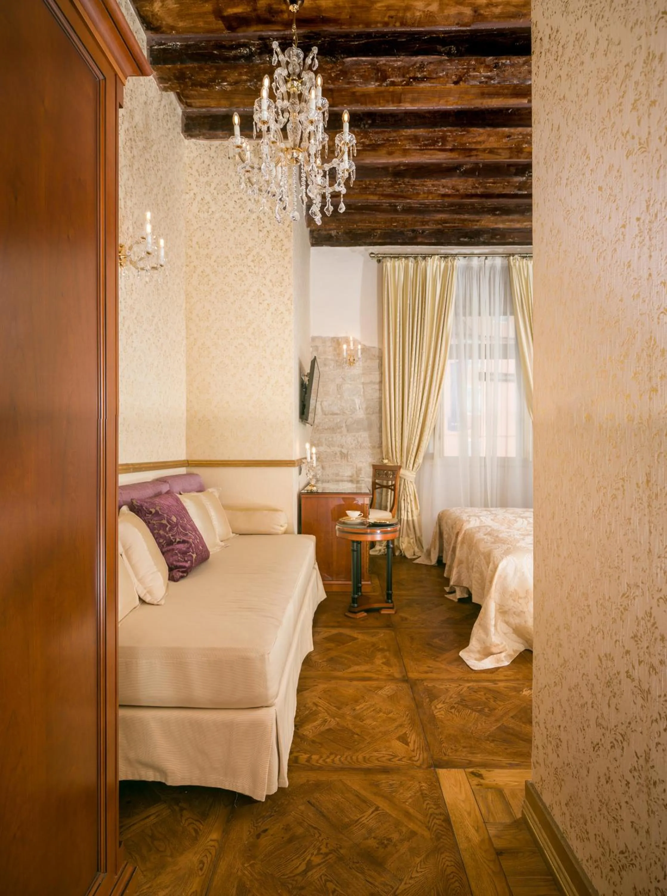 Seating area, Bed in Judita Palace Heritage Hotel
