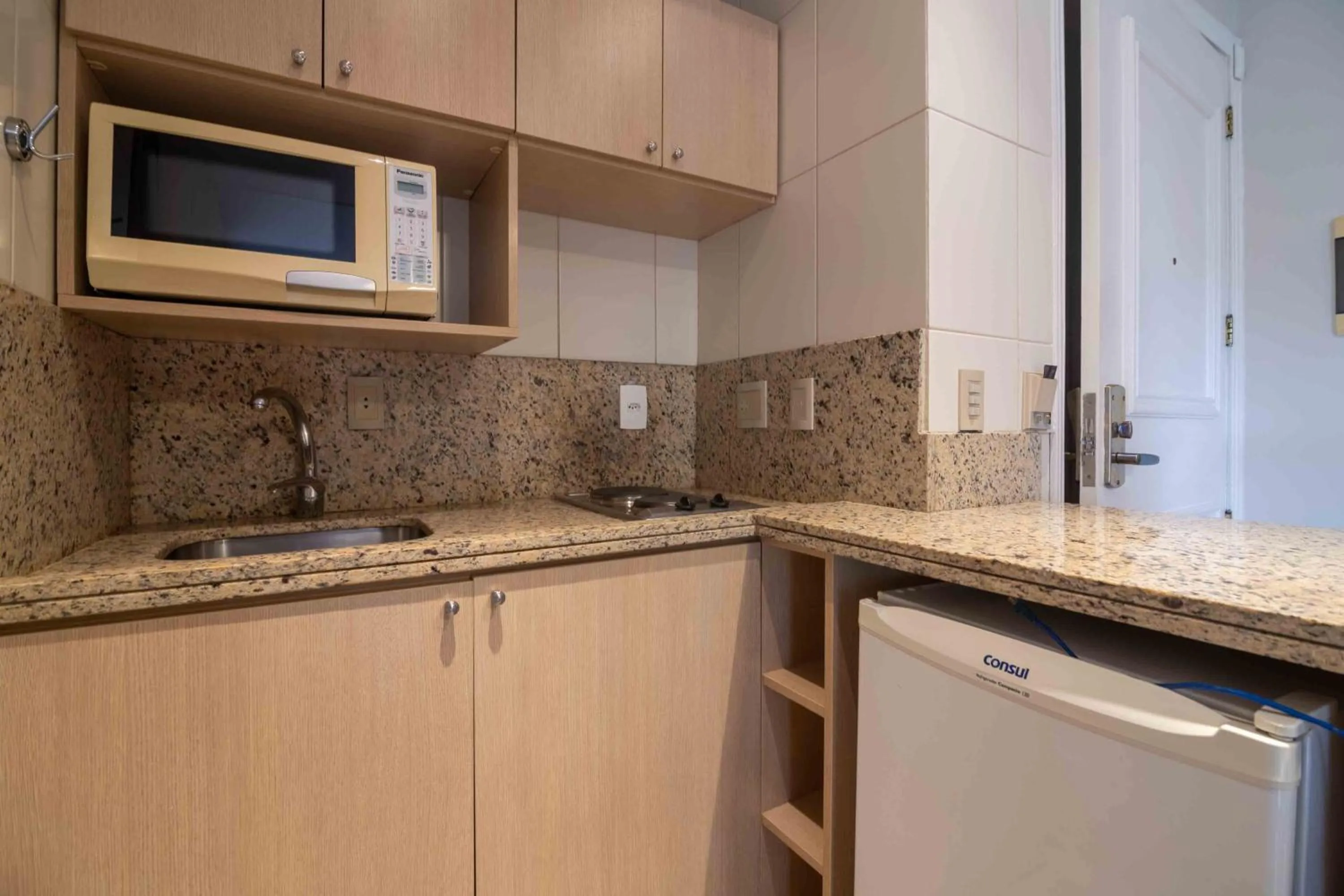 Kitchen or kitchenette in Bela Vista Hotel & Flat