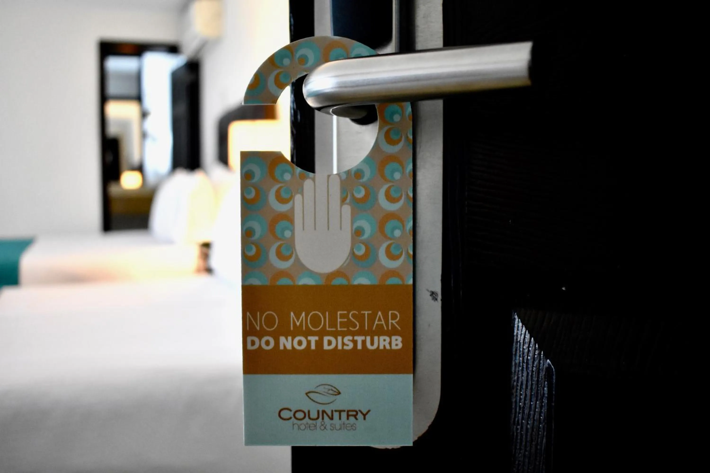 Property logo or sign, Bed in Country Hotel & Suites