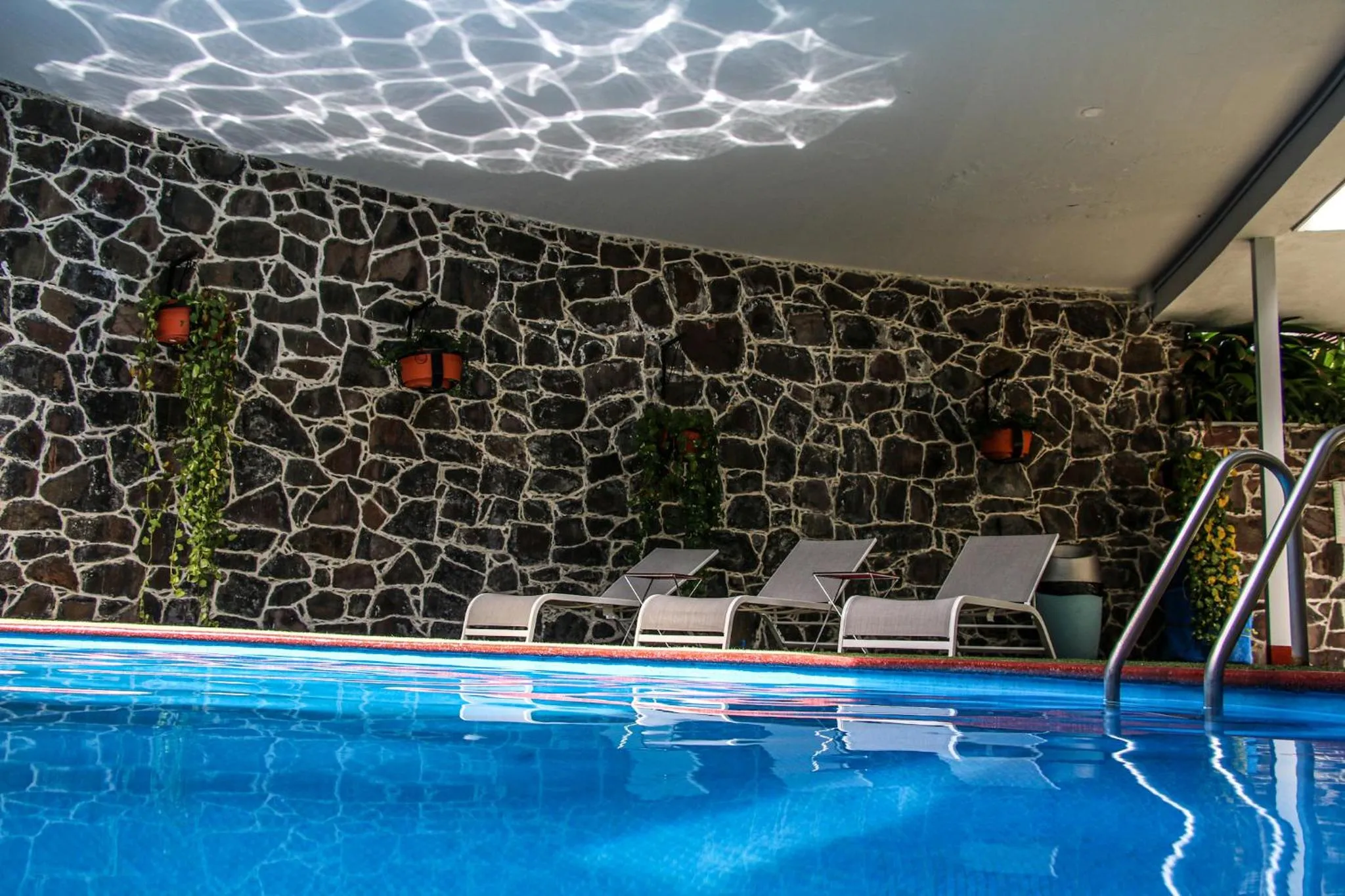 Swimming pool in Country Hotel & Suites