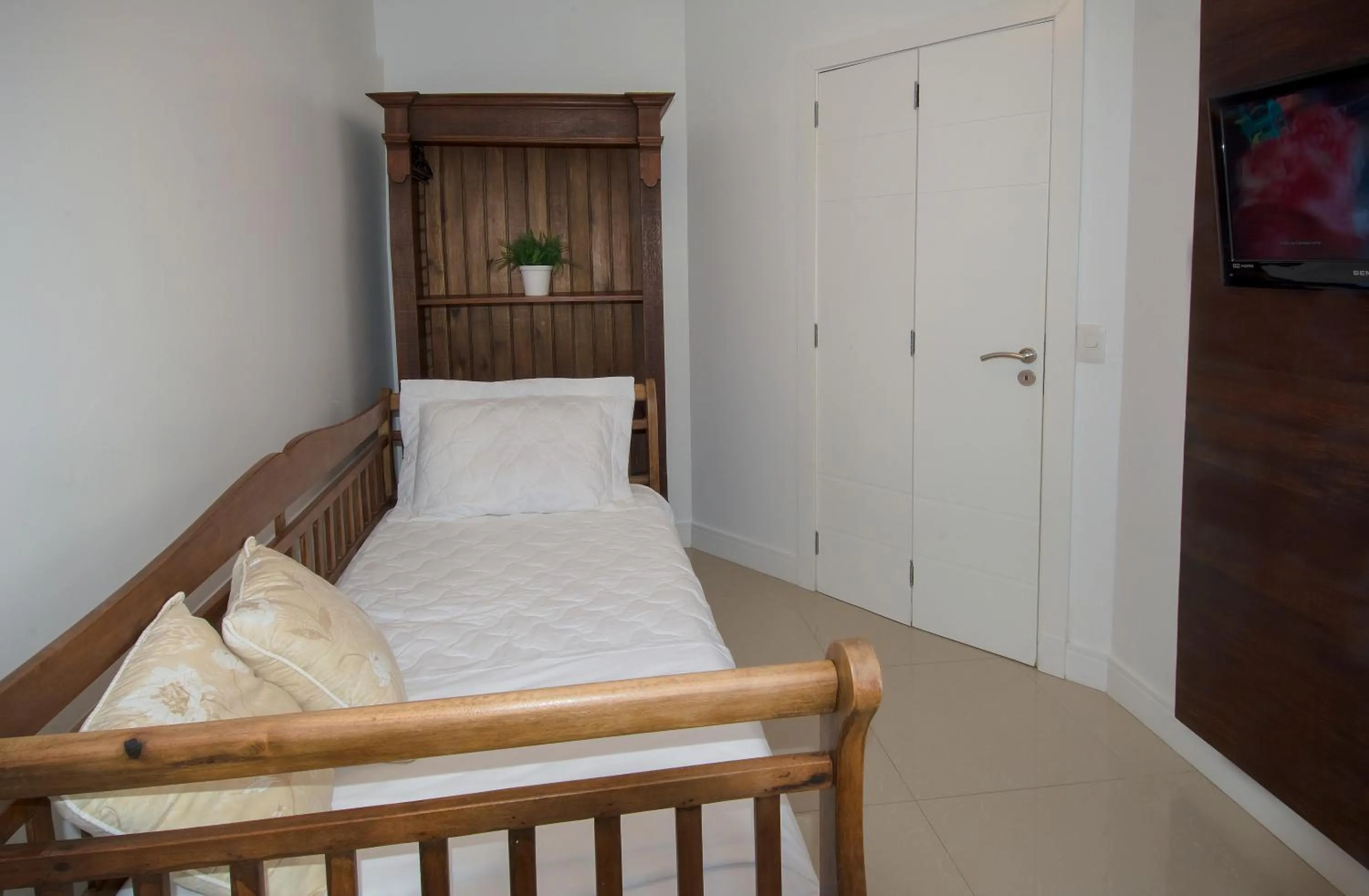 Bed in Pousada Bora Bora