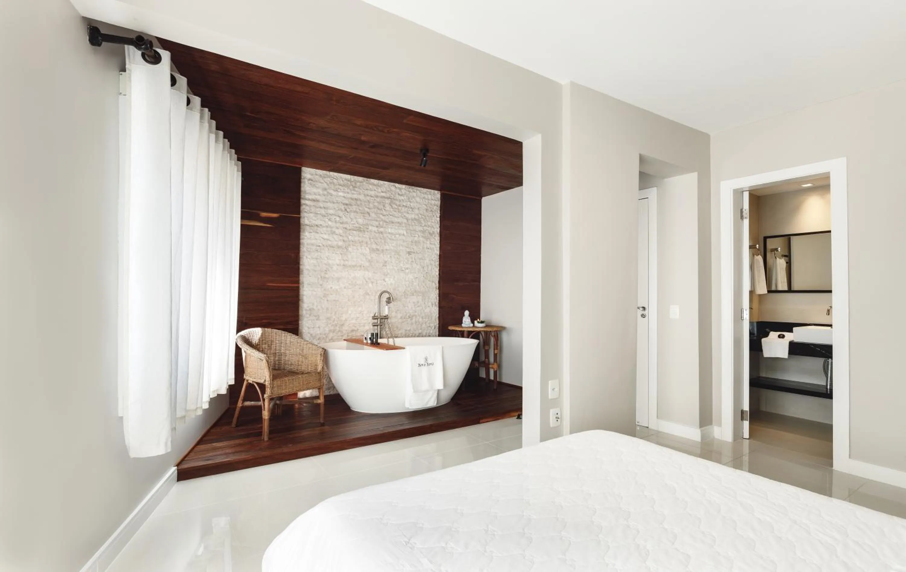 Bed in Pousada Bora Bora