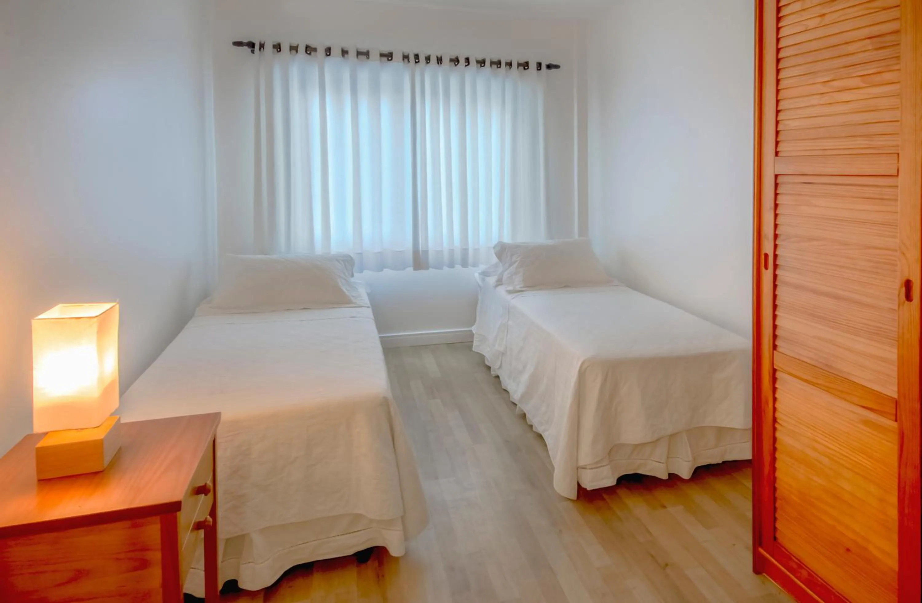 Bed in Pousada Bora Bora