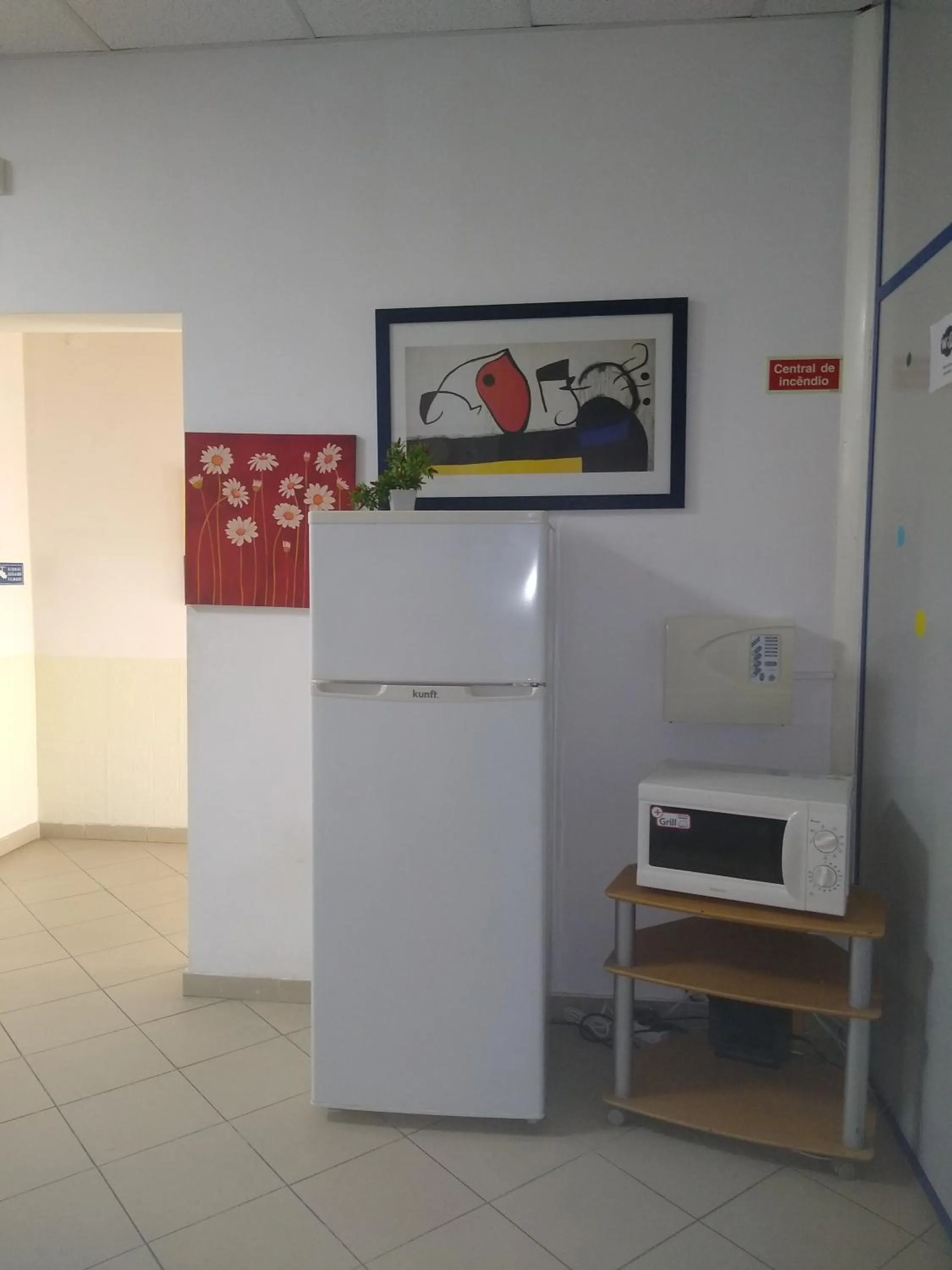 microwave in Melaya Budget Hostel