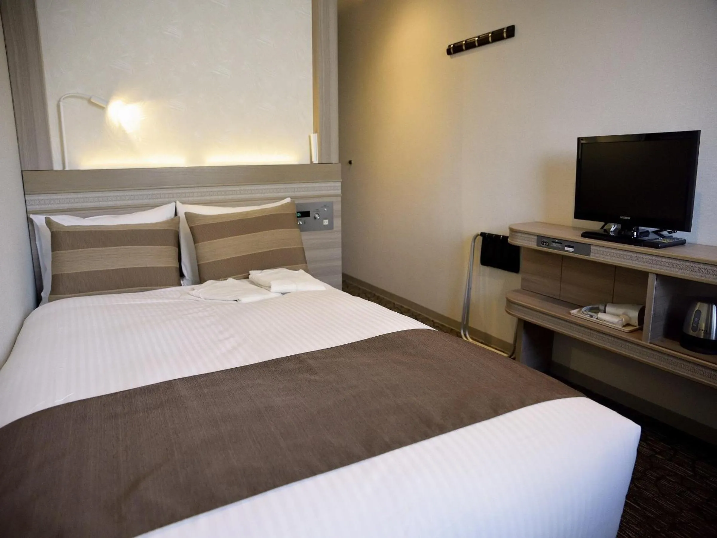 Bed in Hotel Fukuoka Garden Palace