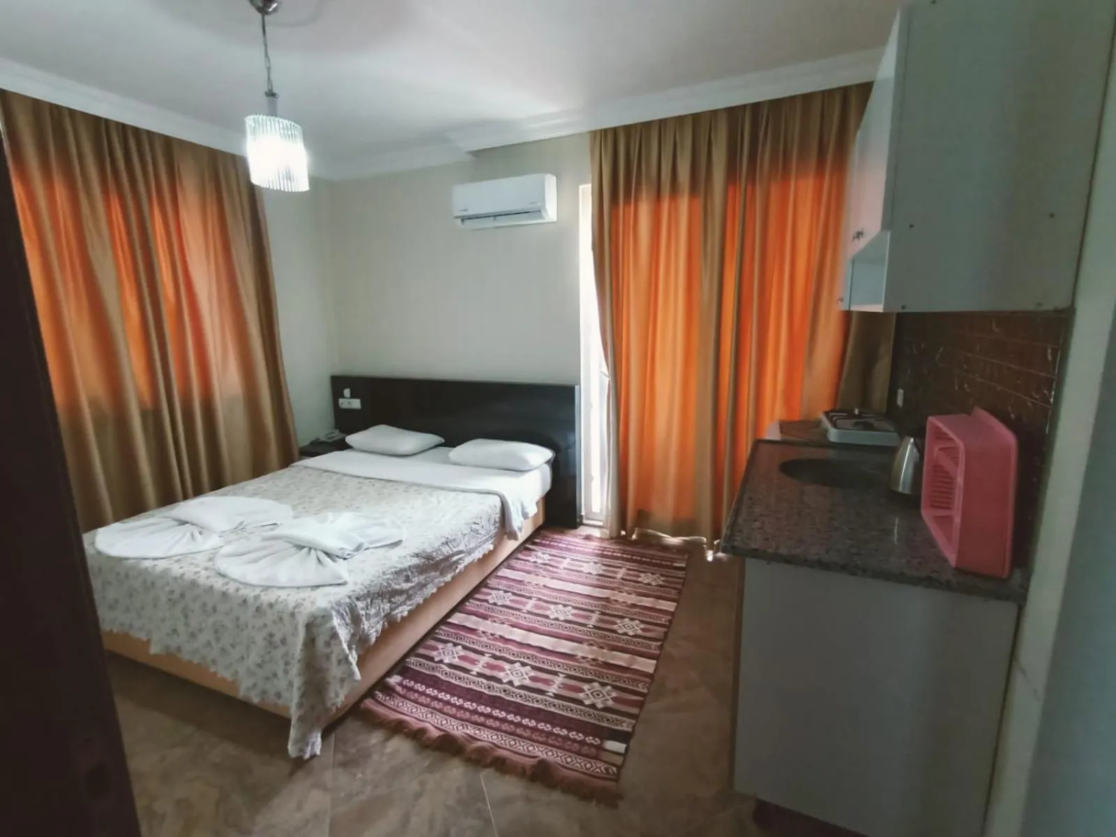 Photo of the whole room, Bed in Le Moral Apart Hotel