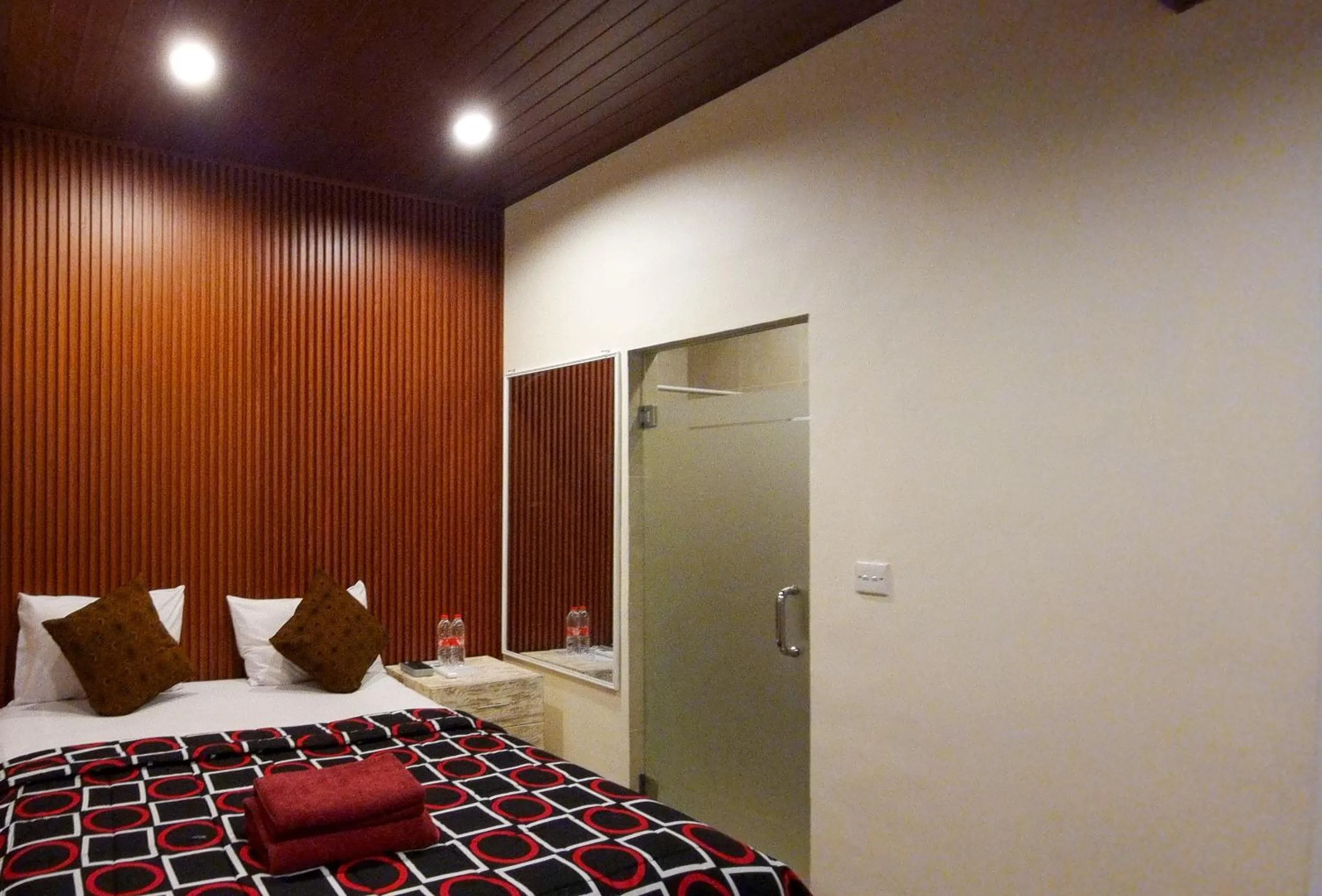 Bed in Gustav Bali Homestay and Massage