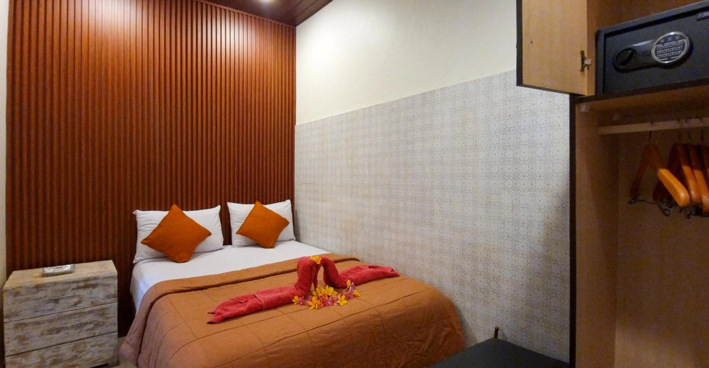 Bed in Gustav Bali Homestay and Massage