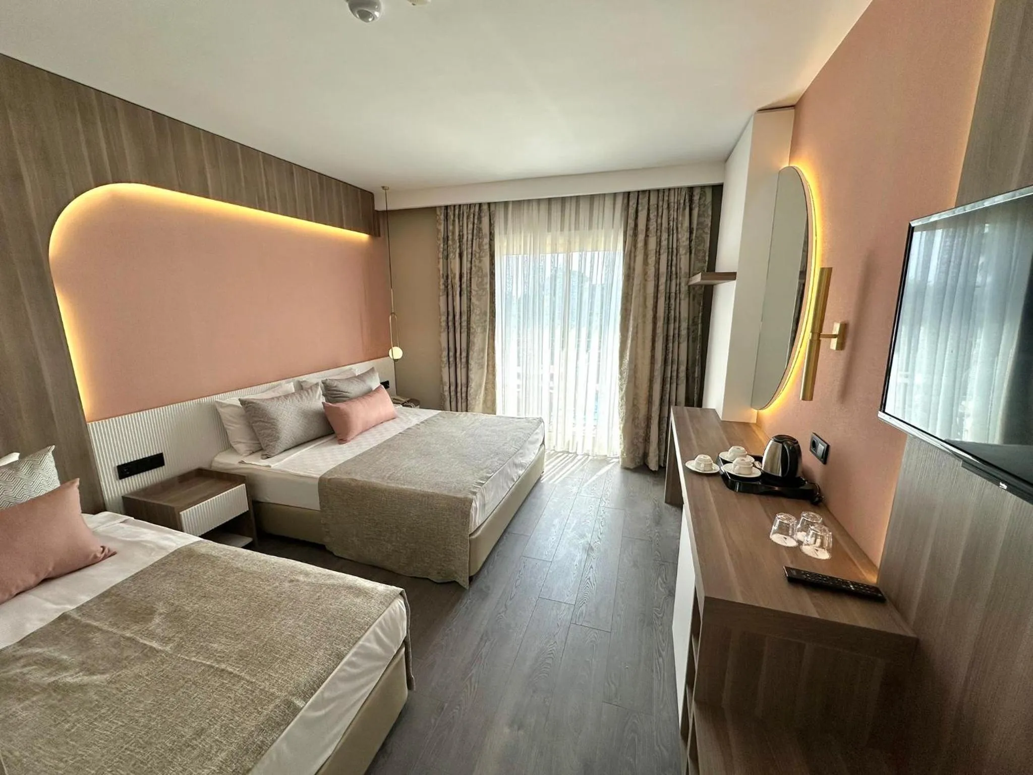 Photo of the whole room, Bed in L'Oceanica Beach Resort