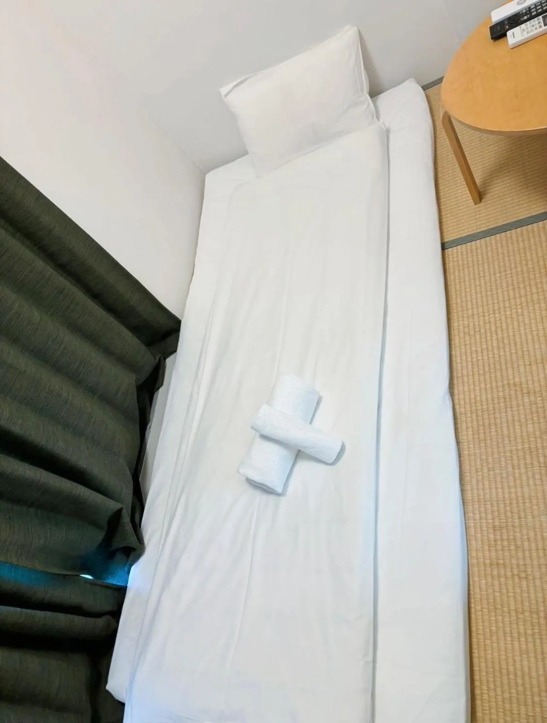 Bed in Uhome Kanda Hotel