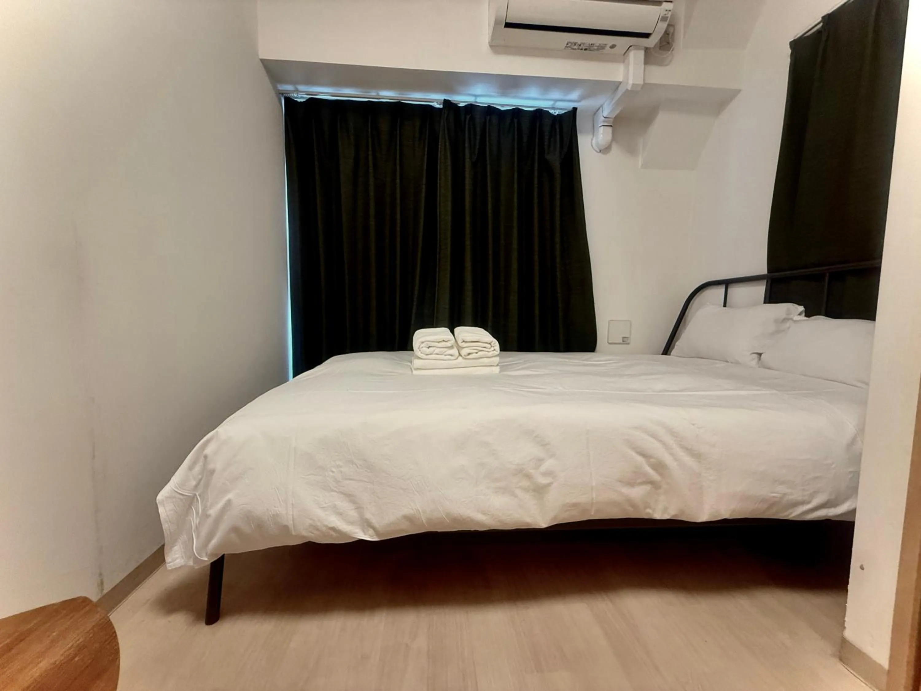 Bed in Uhome Kanda Hotel
