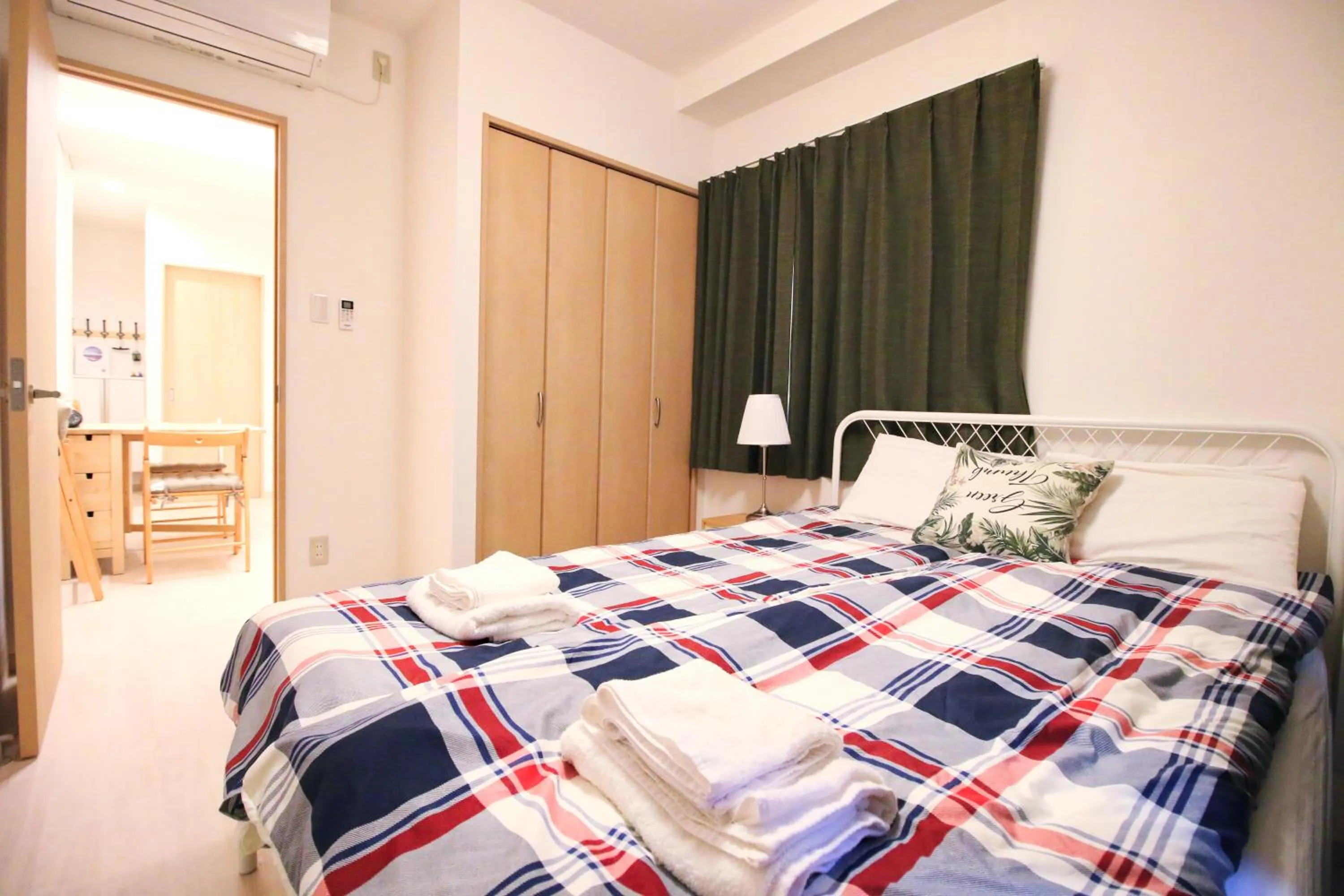 Bed in Uhome Kanda Hotel