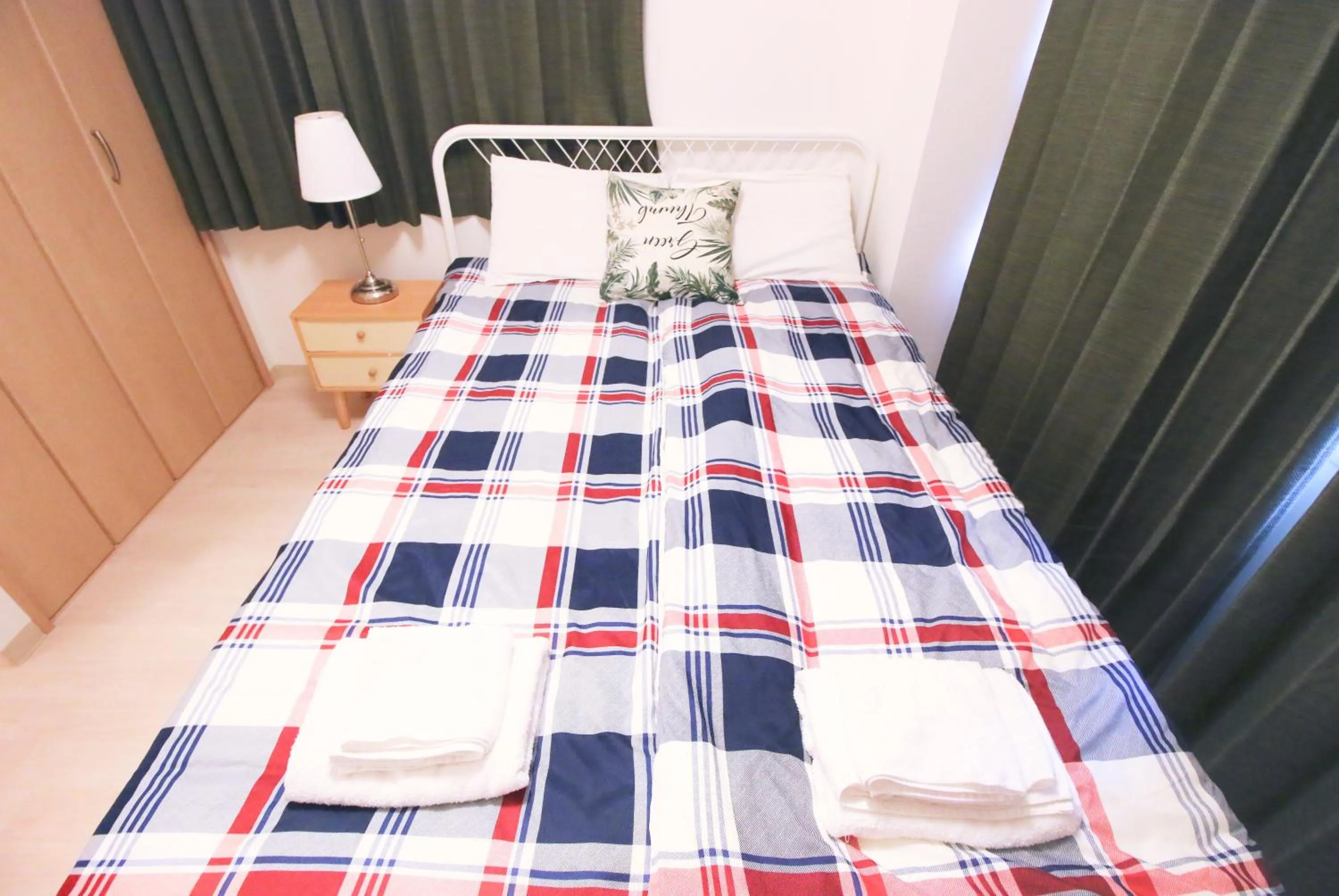 Bed in Uhome Kanda Hotel