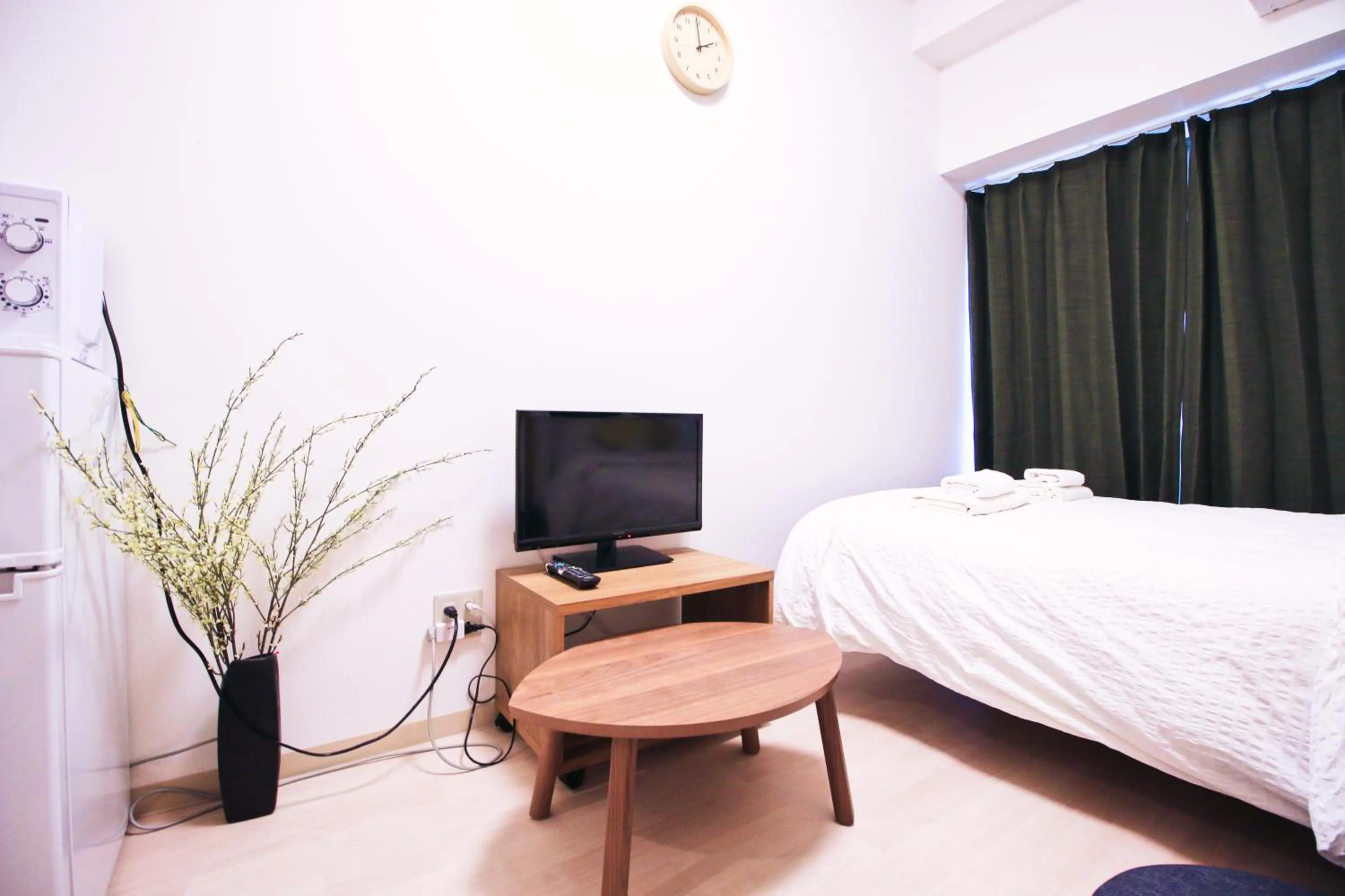 Bed in Uhome Kanda Hotel