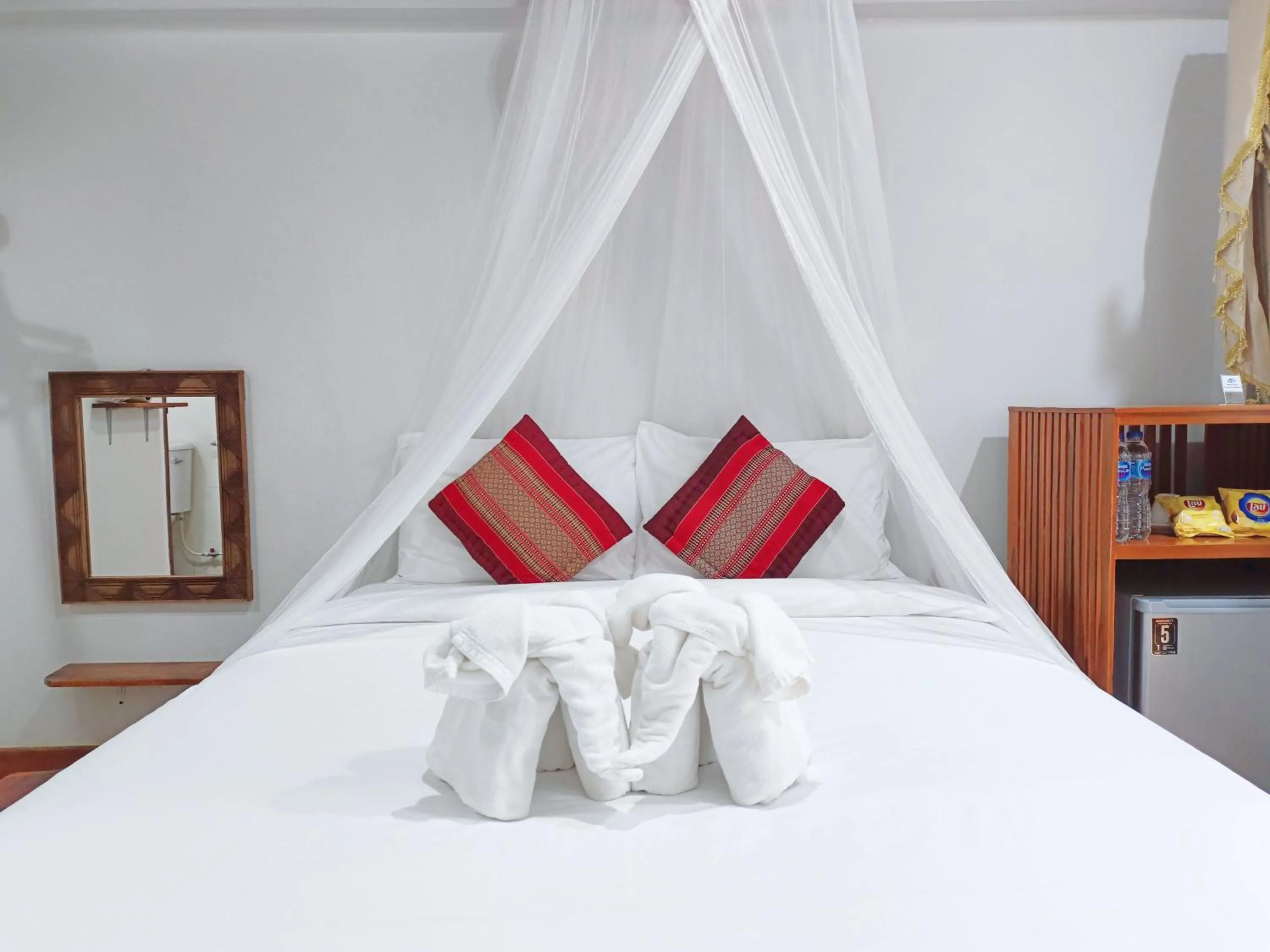 Bed in Apilapa Hotel