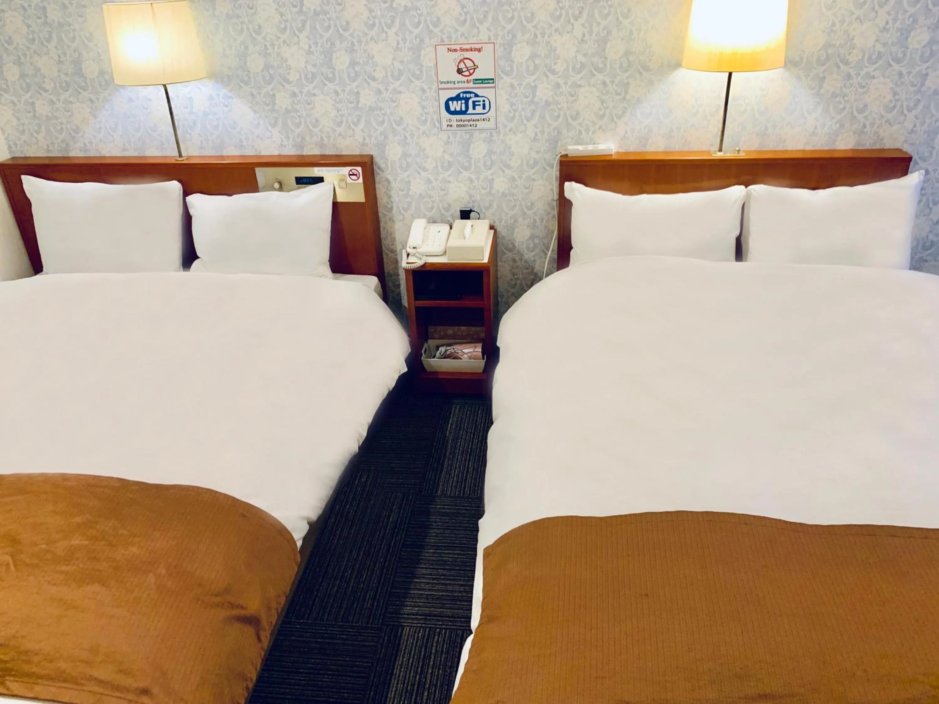 Bed in Tokyo Plaza Hotel