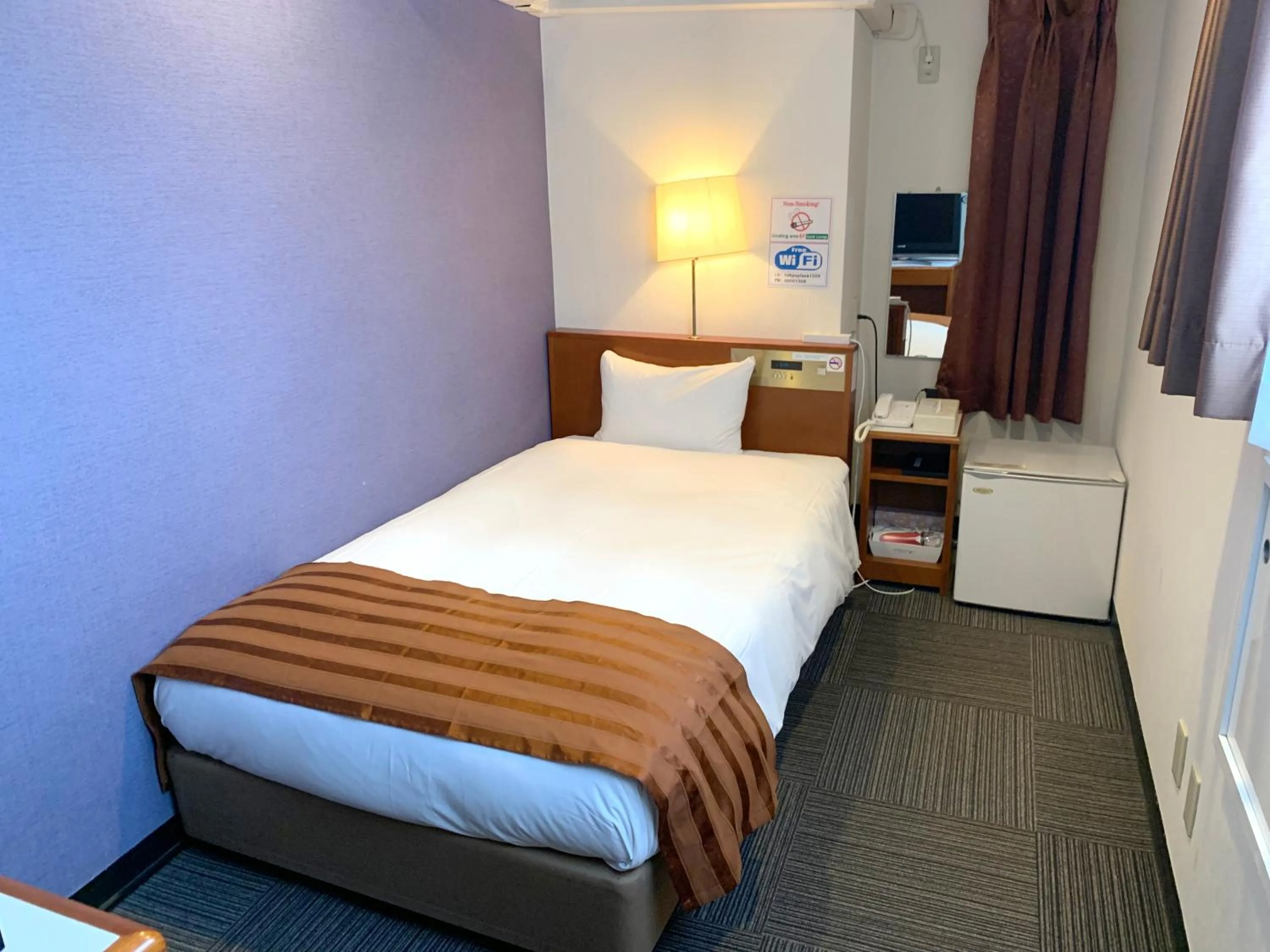 Bed in Tokyo Plaza Hotel