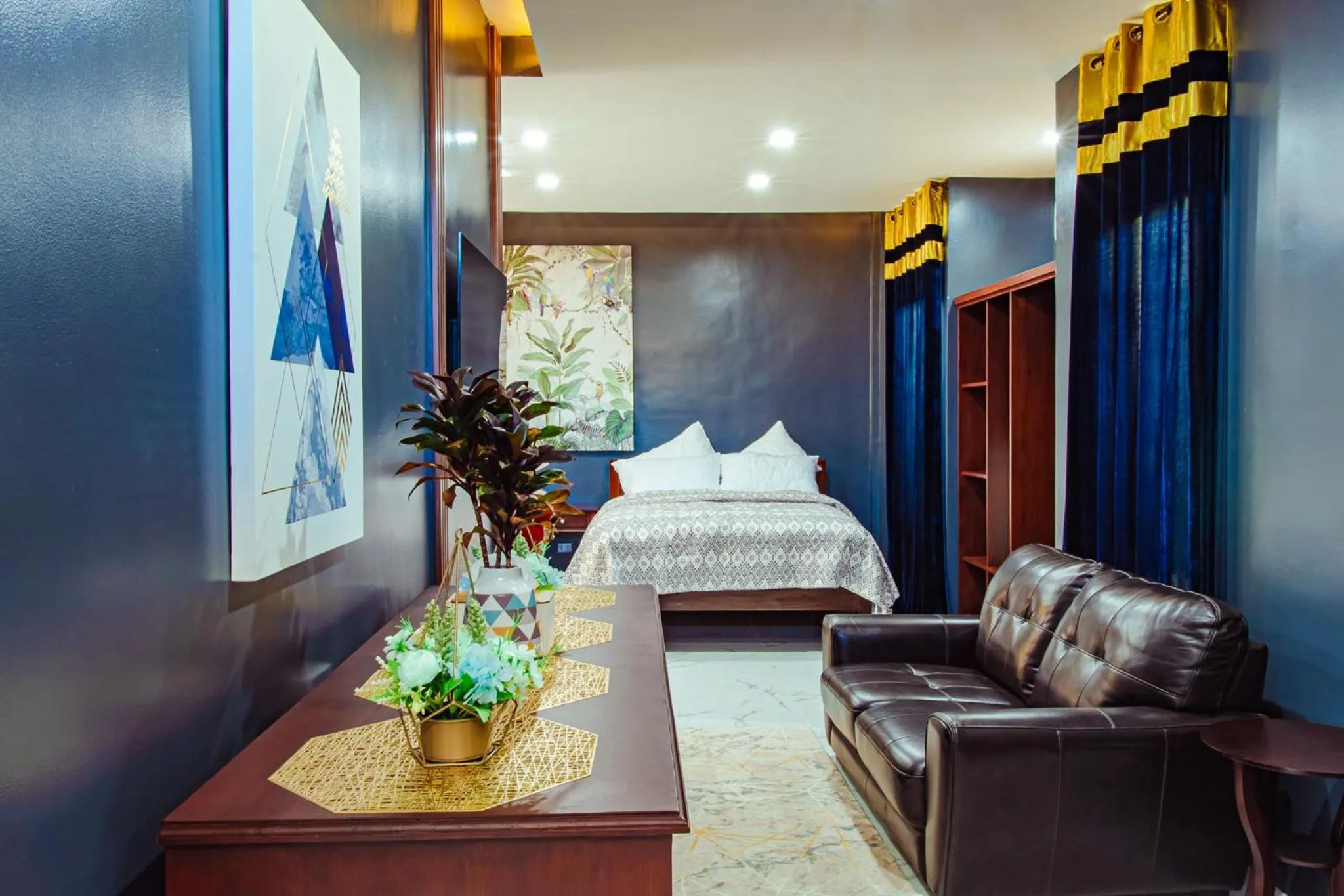 Living room, Bed in Marqis Sunrise Sunset Resort and Spa