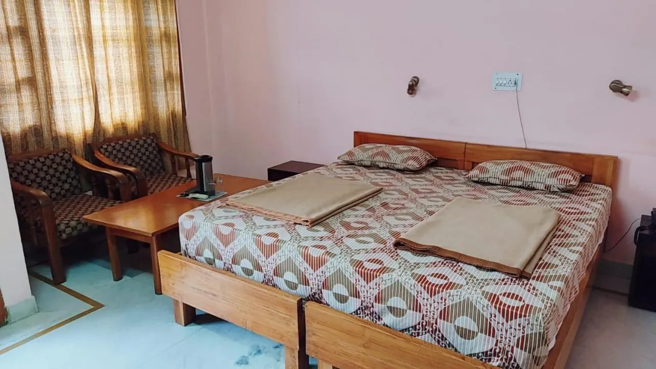 Bed in Hotel Atul Regency