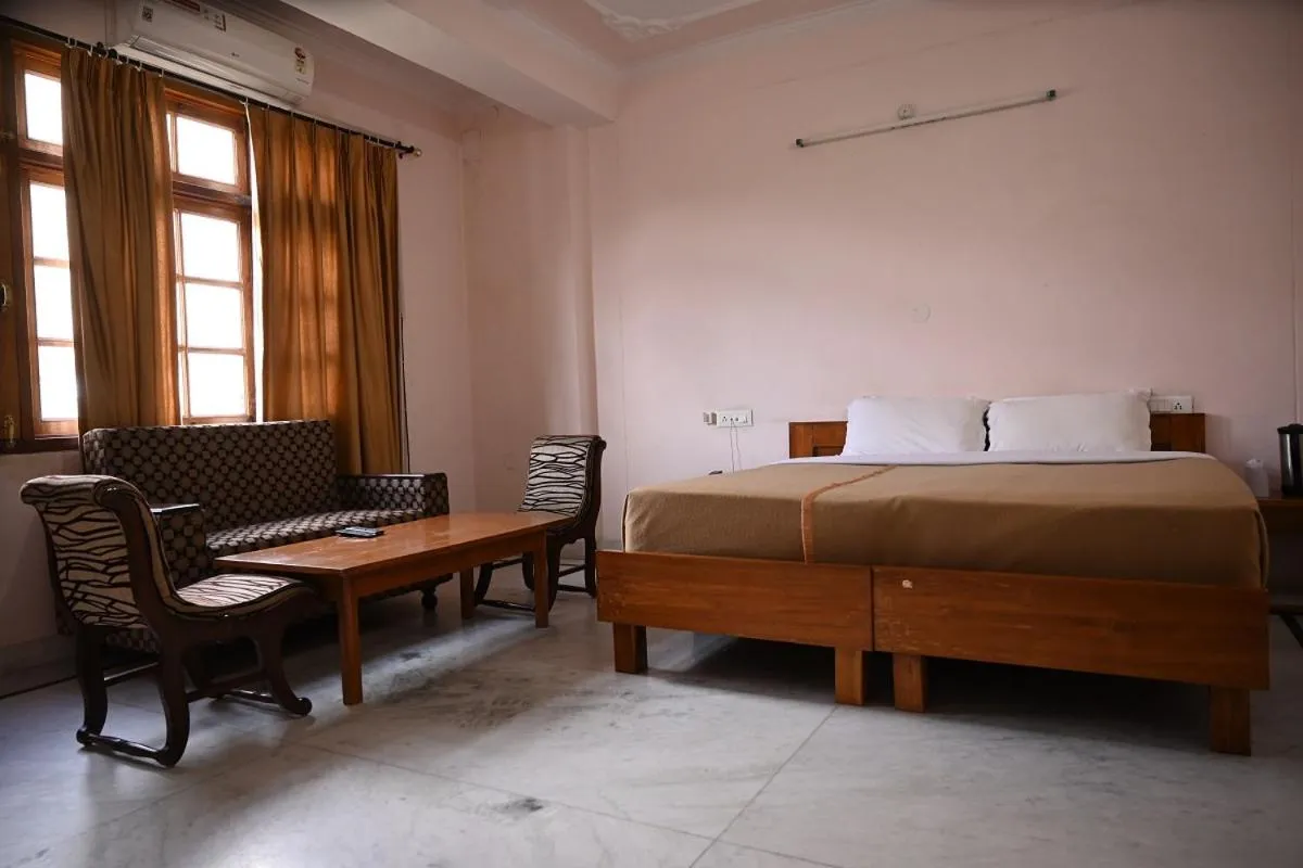 Bed in Hotel Atul Regency