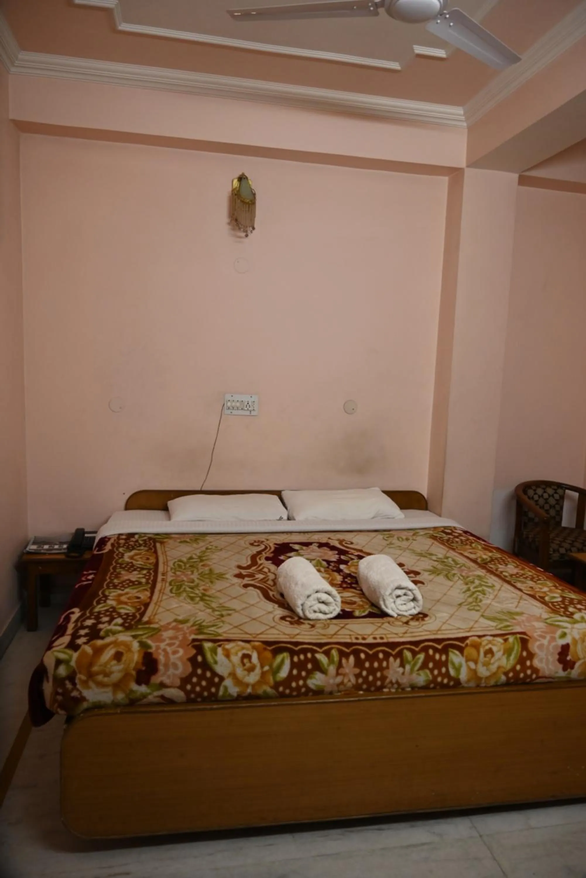 Bed in Hotel Atul Regency