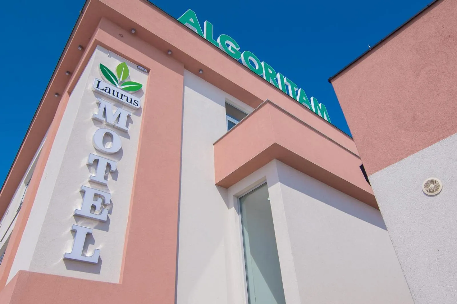 Property logo or sign in Laurus Motel Airport Tuzla