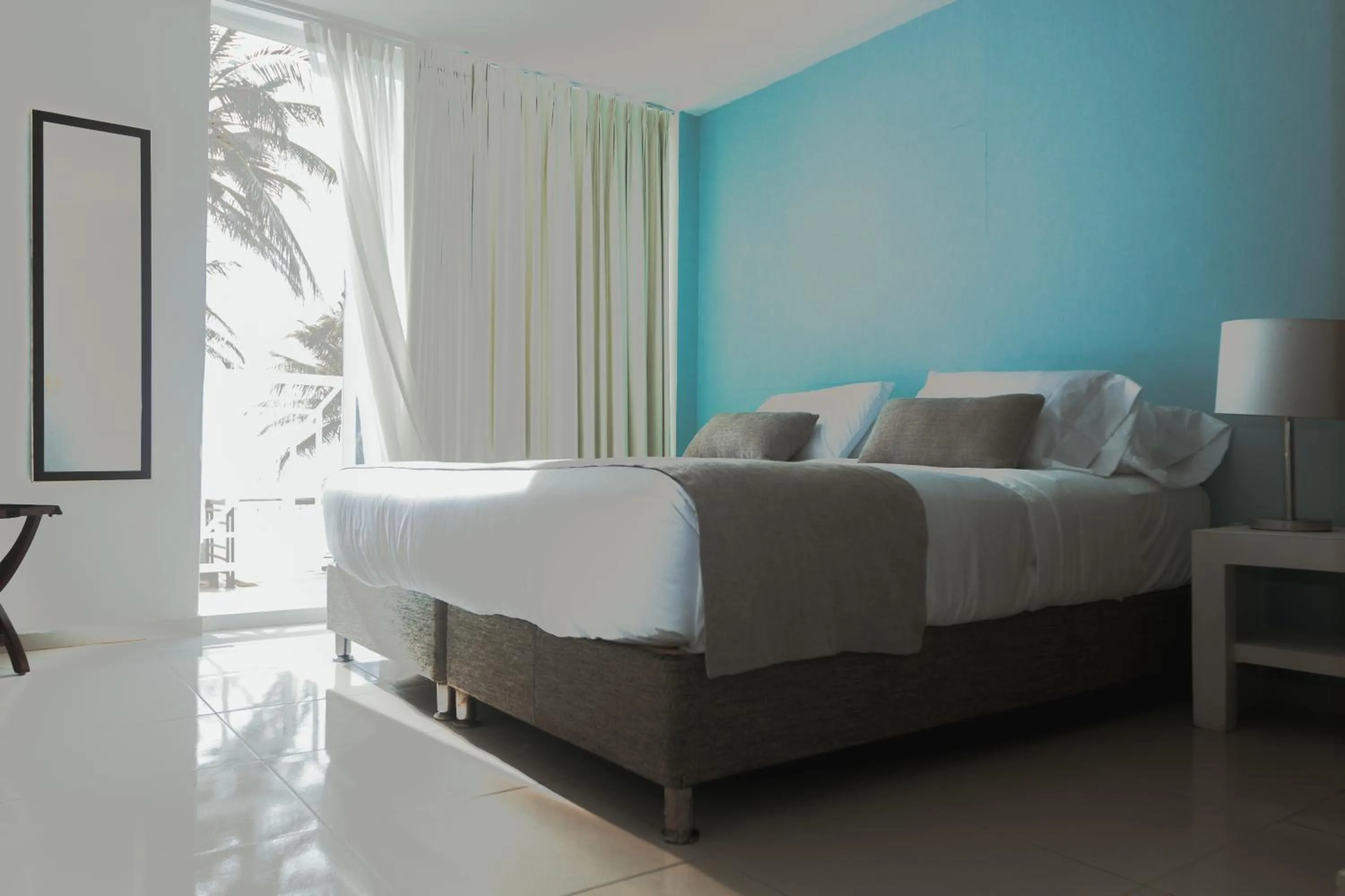 Photo of the whole room, Bed in Hotel San Luis Beach House By OxoHotel