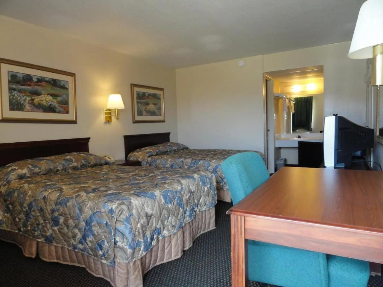 Photo of the whole room, Bed in Red Carpet Inn (formerly Royal Inn)
