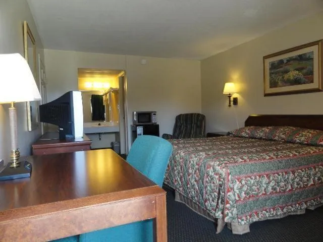 Photo of the whole room, Bed in Red Carpet Inn (formerly Royal Inn)