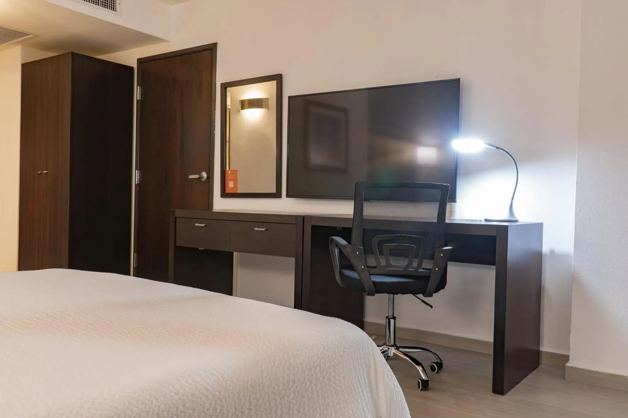 Facade/entrance, Bed in Fiesta Inn Tepic