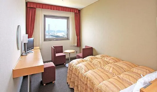 Photo of the whole room, Bed in Okura Hotel Marugame