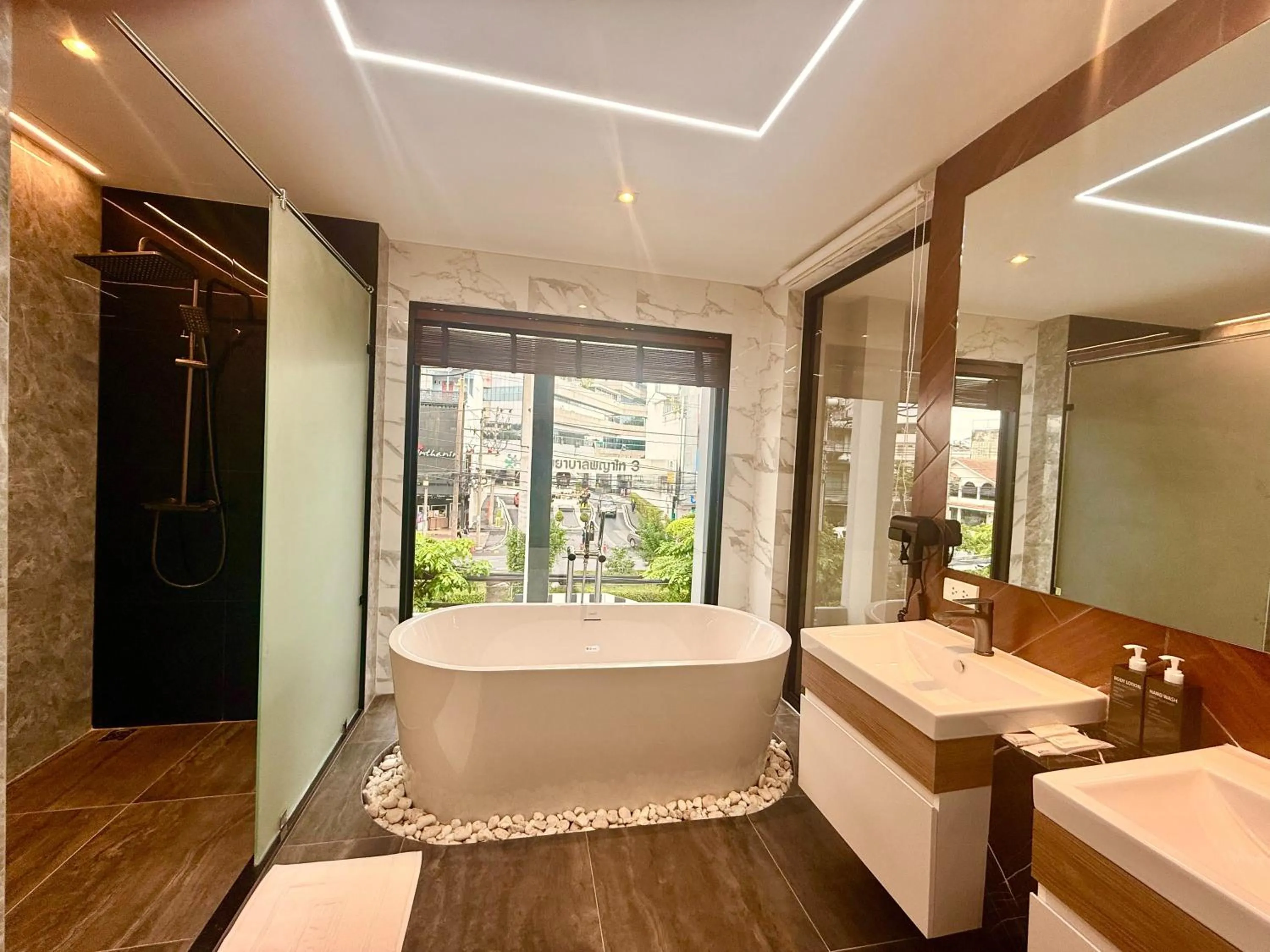 Bathroom in Bed by Tha-Pra SHA Plus