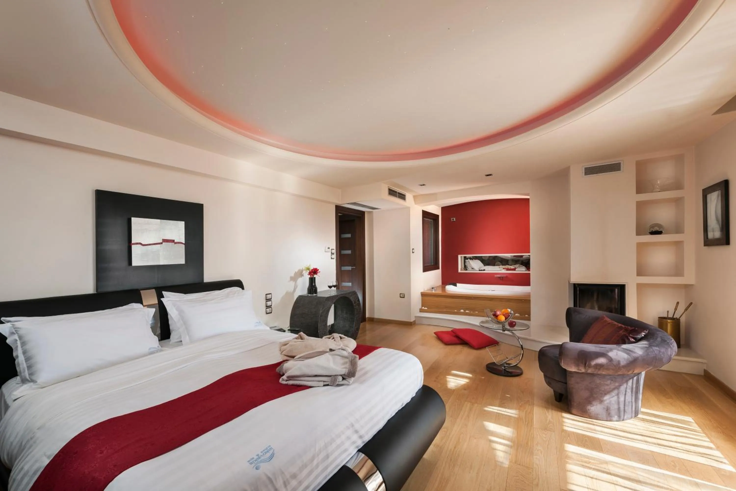 Photo of the whole room, Bed in Iakovakis Suites & Spa