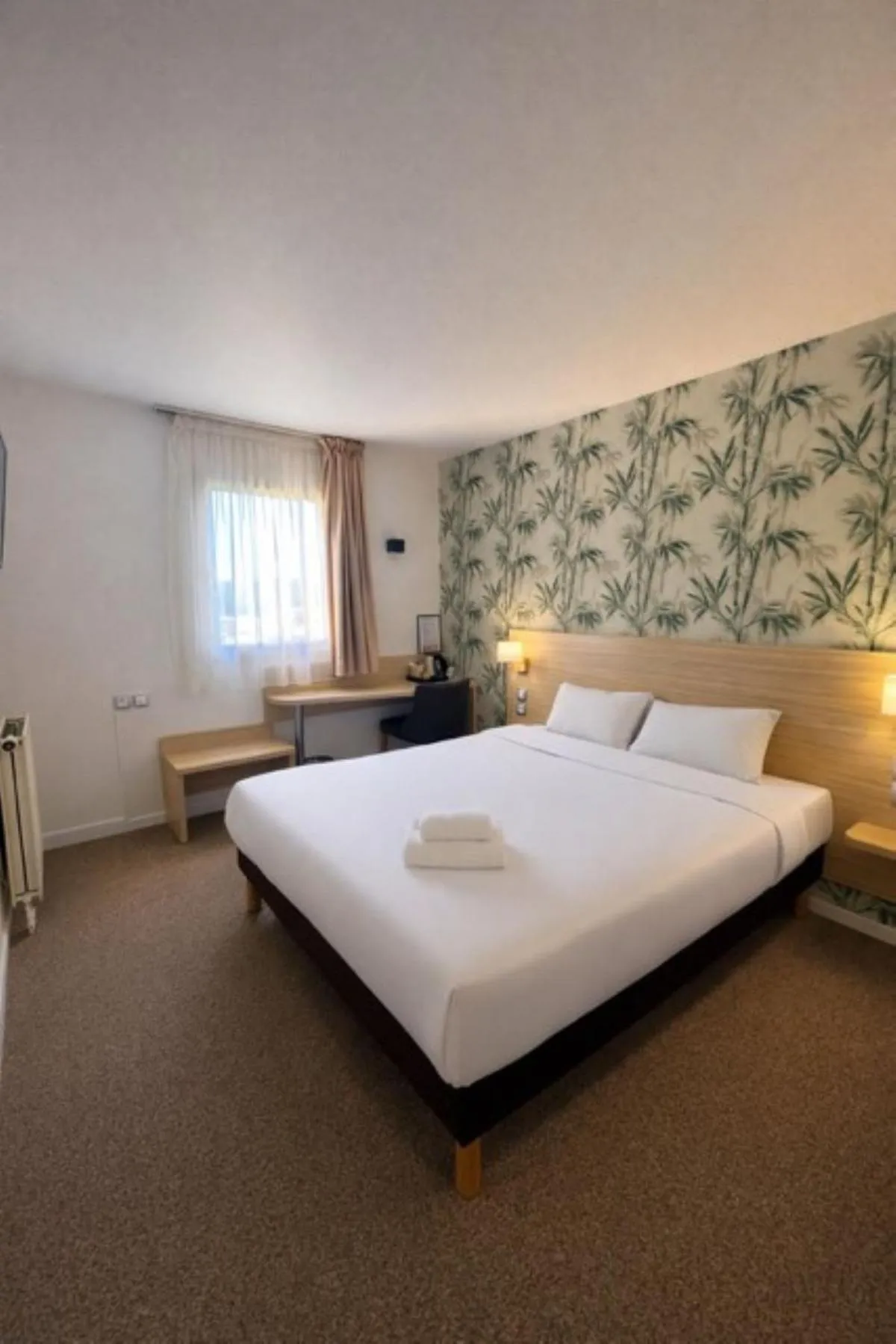 Bed in Logis Hotel Altina