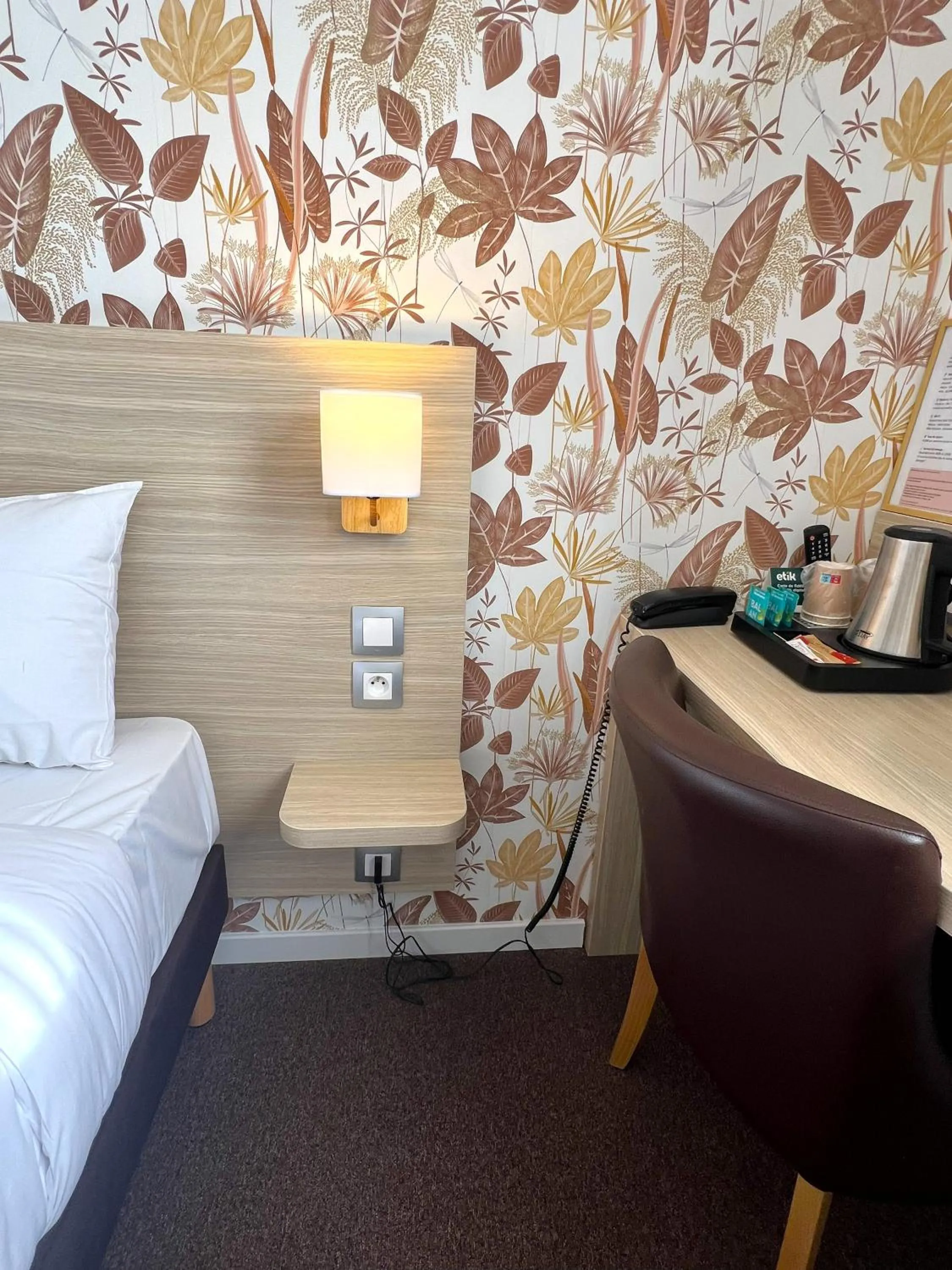 Bed in Logis Hotel Altina