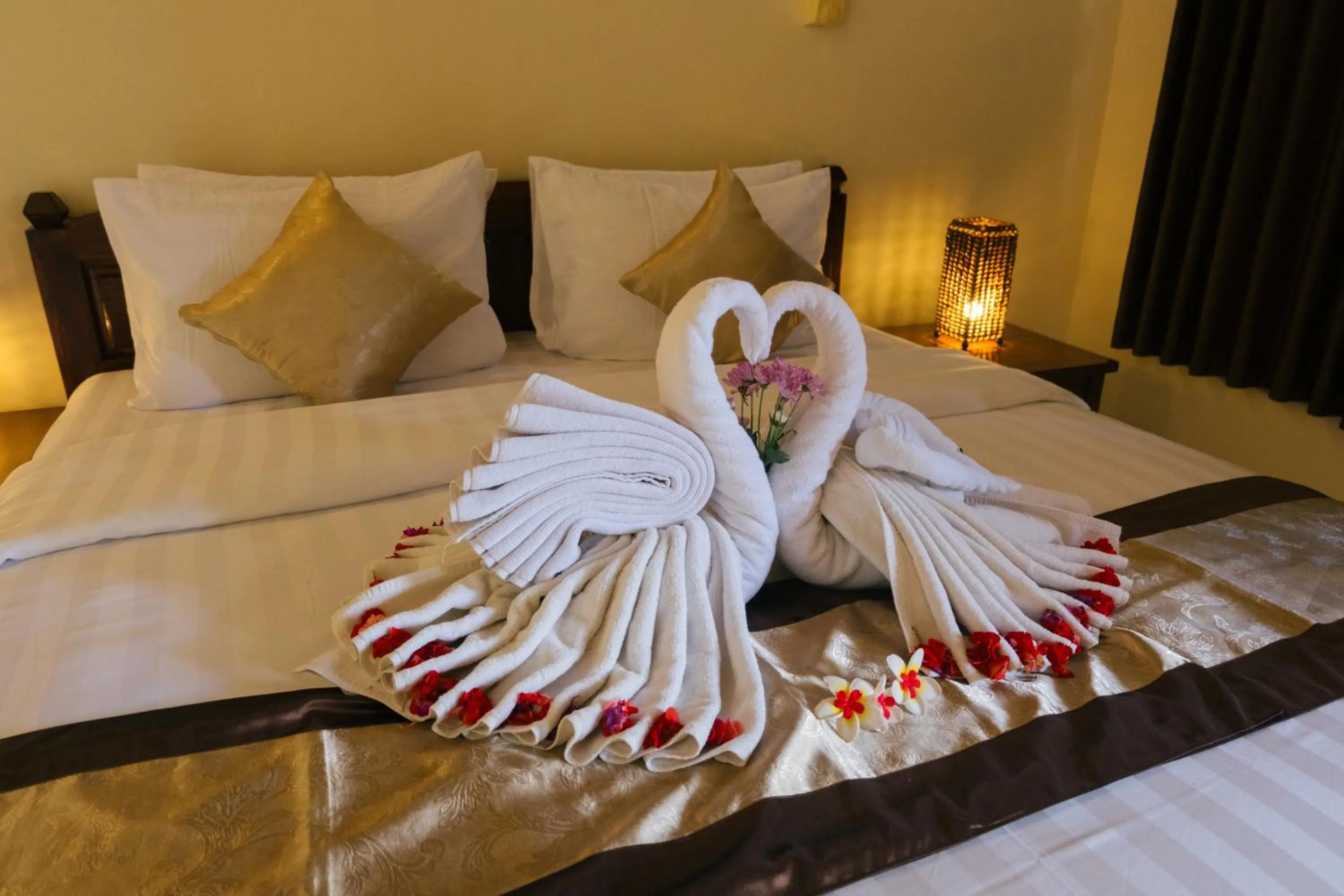 Bed in New Starlight Hotel Lovina