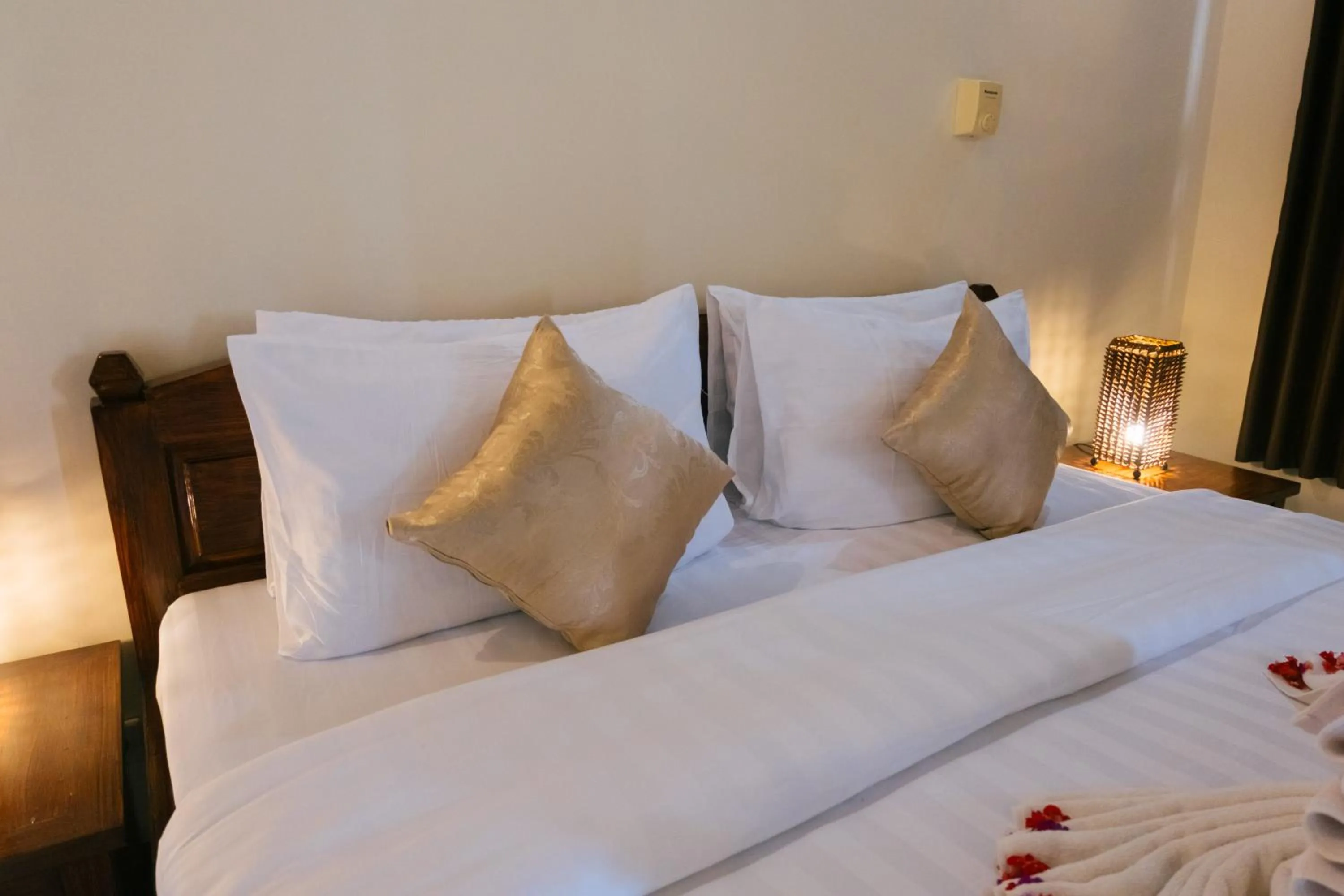 Bed in New Starlight Hotel Lovina