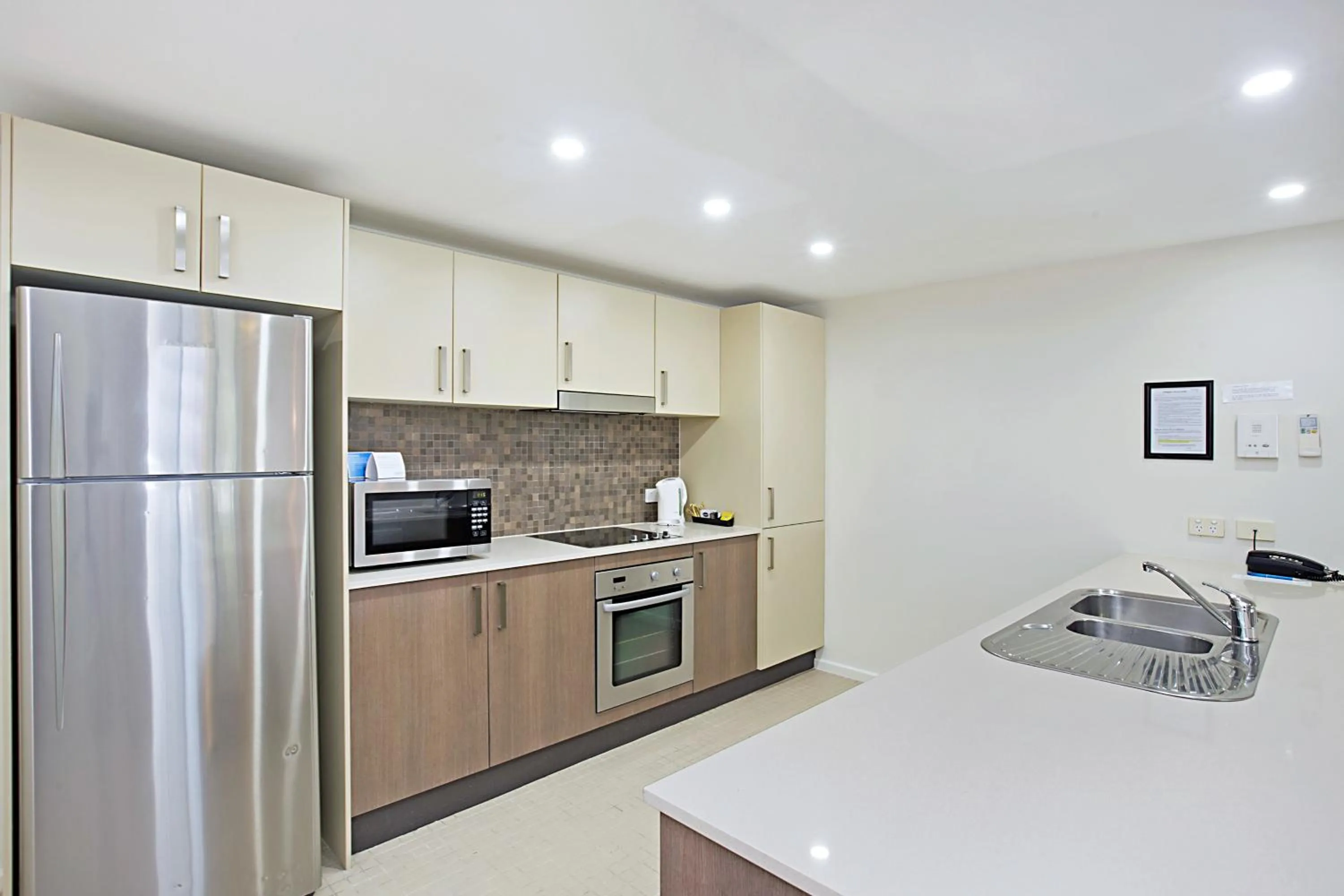 Kitchen or kitchenette in Mantra Nelson Bay