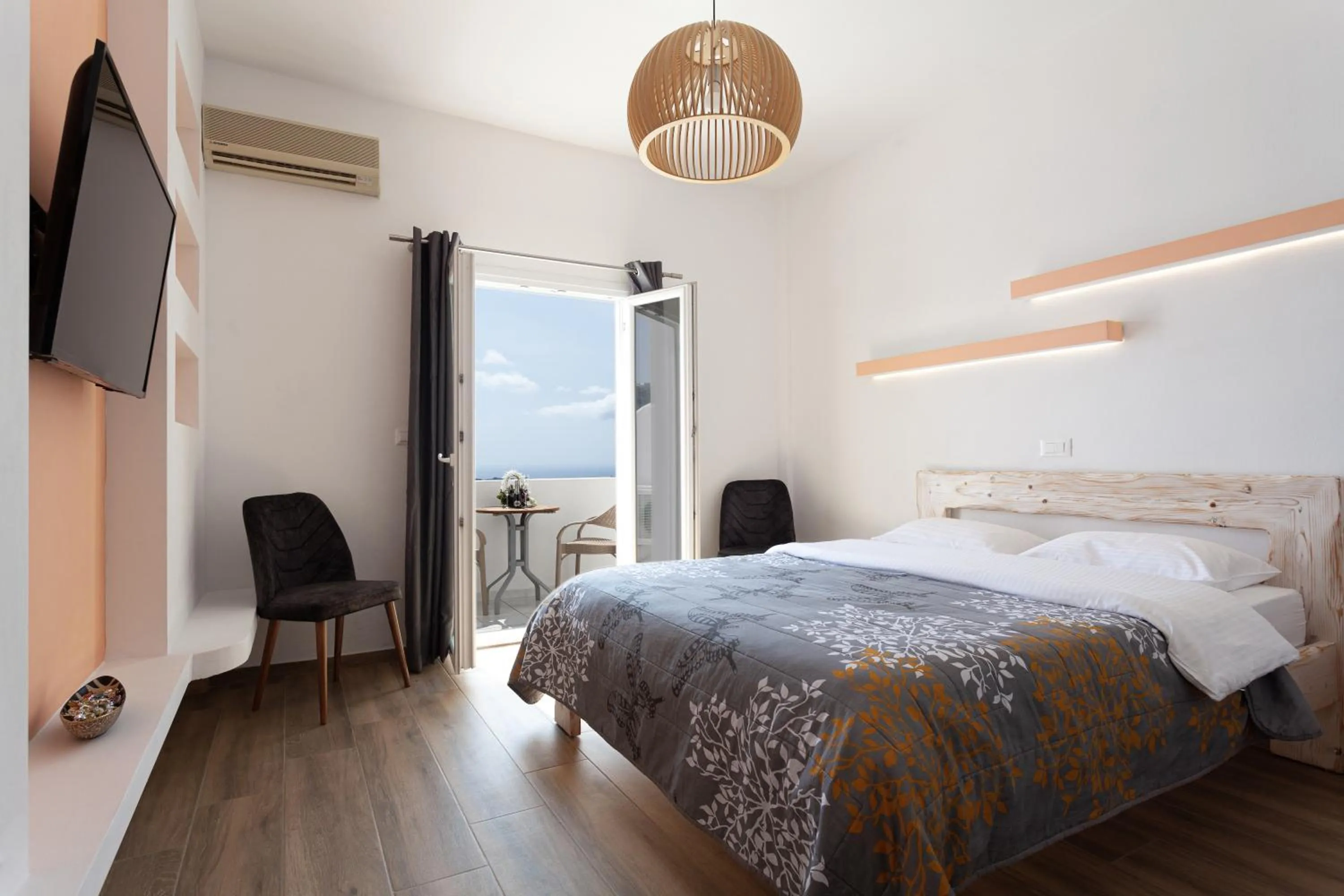Bed in Caldera Butterfly Villas