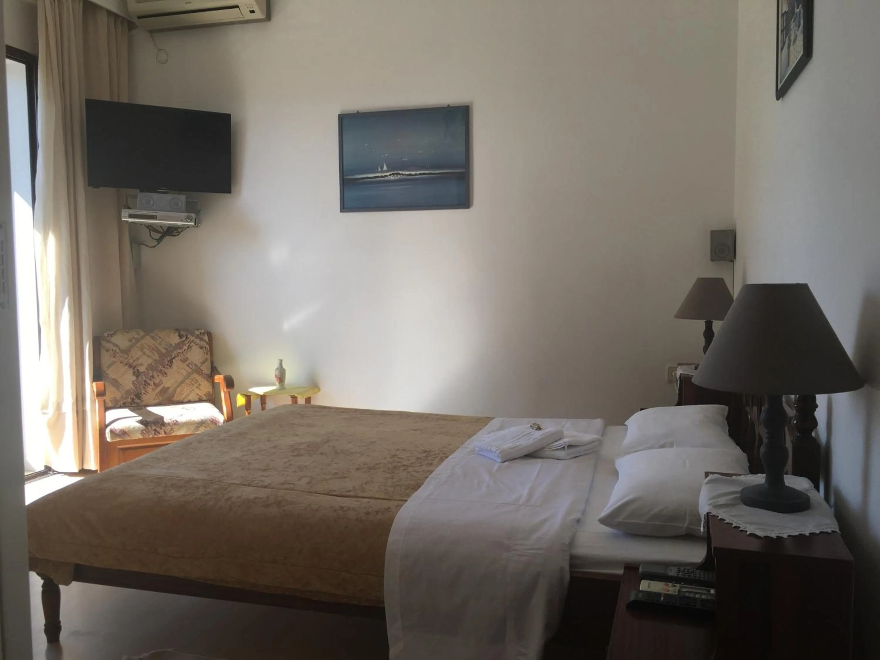 Bedroom in Chris Studios & Apartments