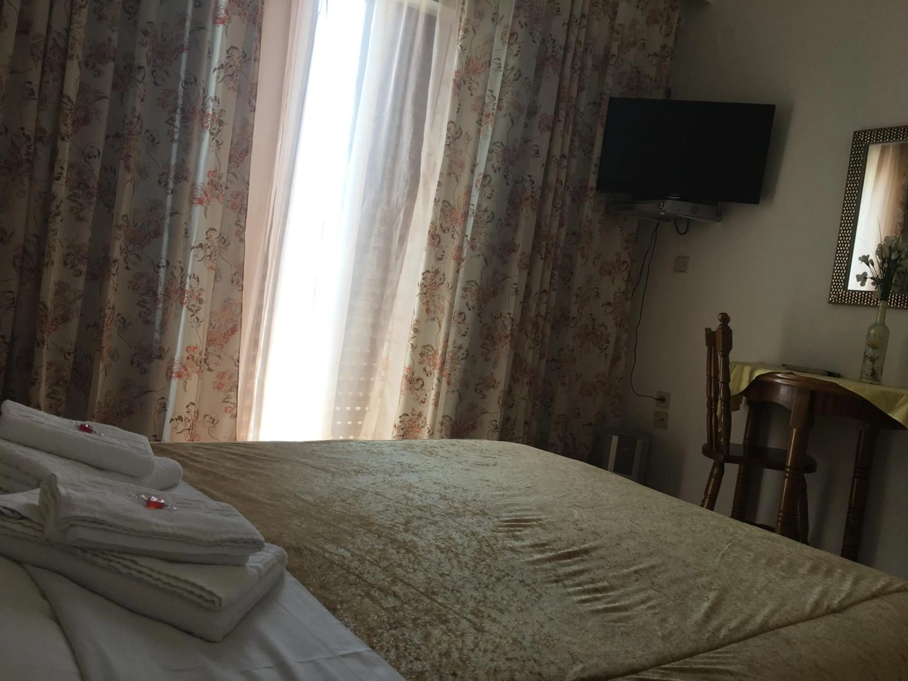 Bedroom in Chris Studios & Apartments