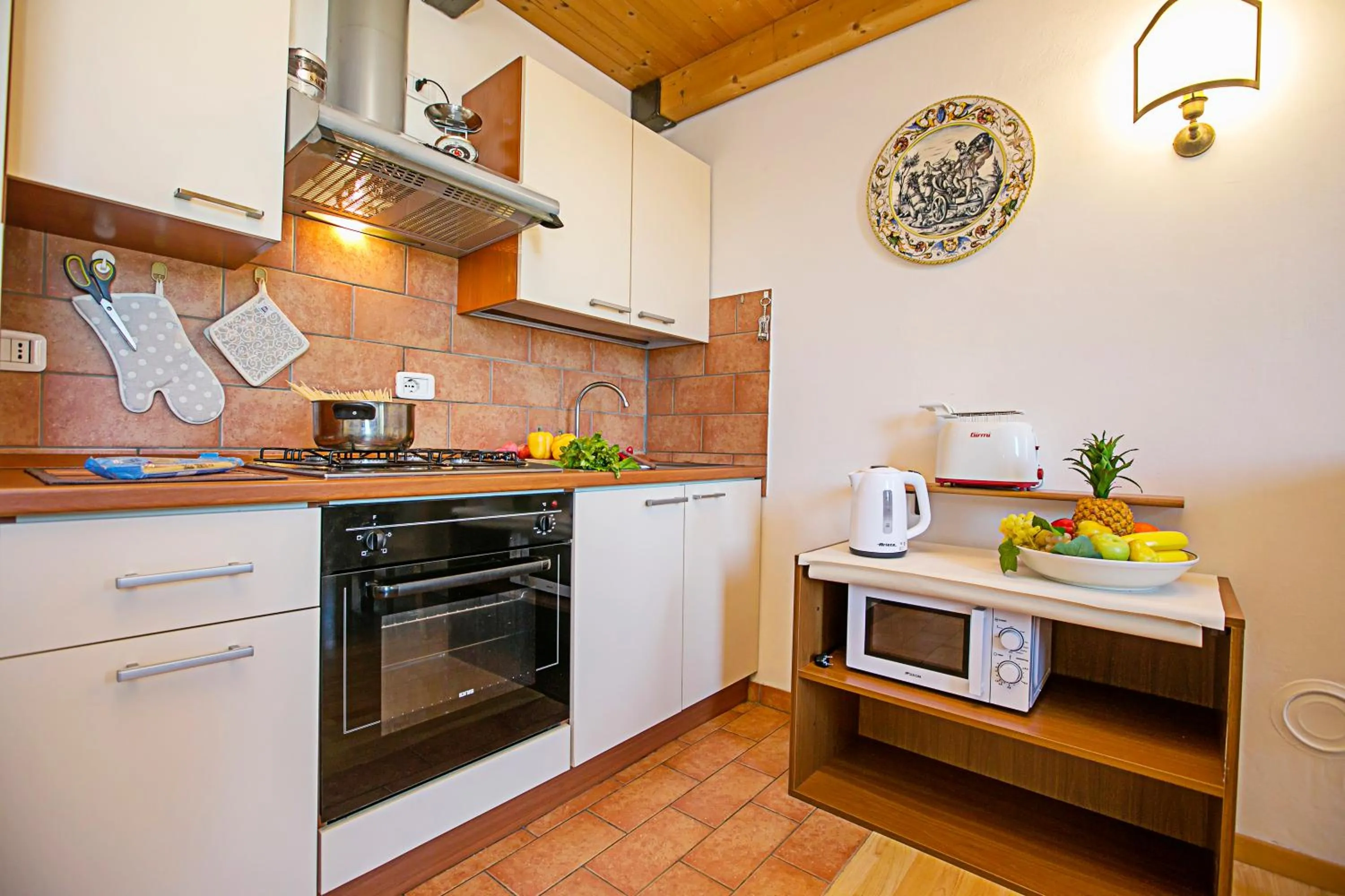 Kitchen or kitchenette in Appartamento Villa Lina - Happy Rentals