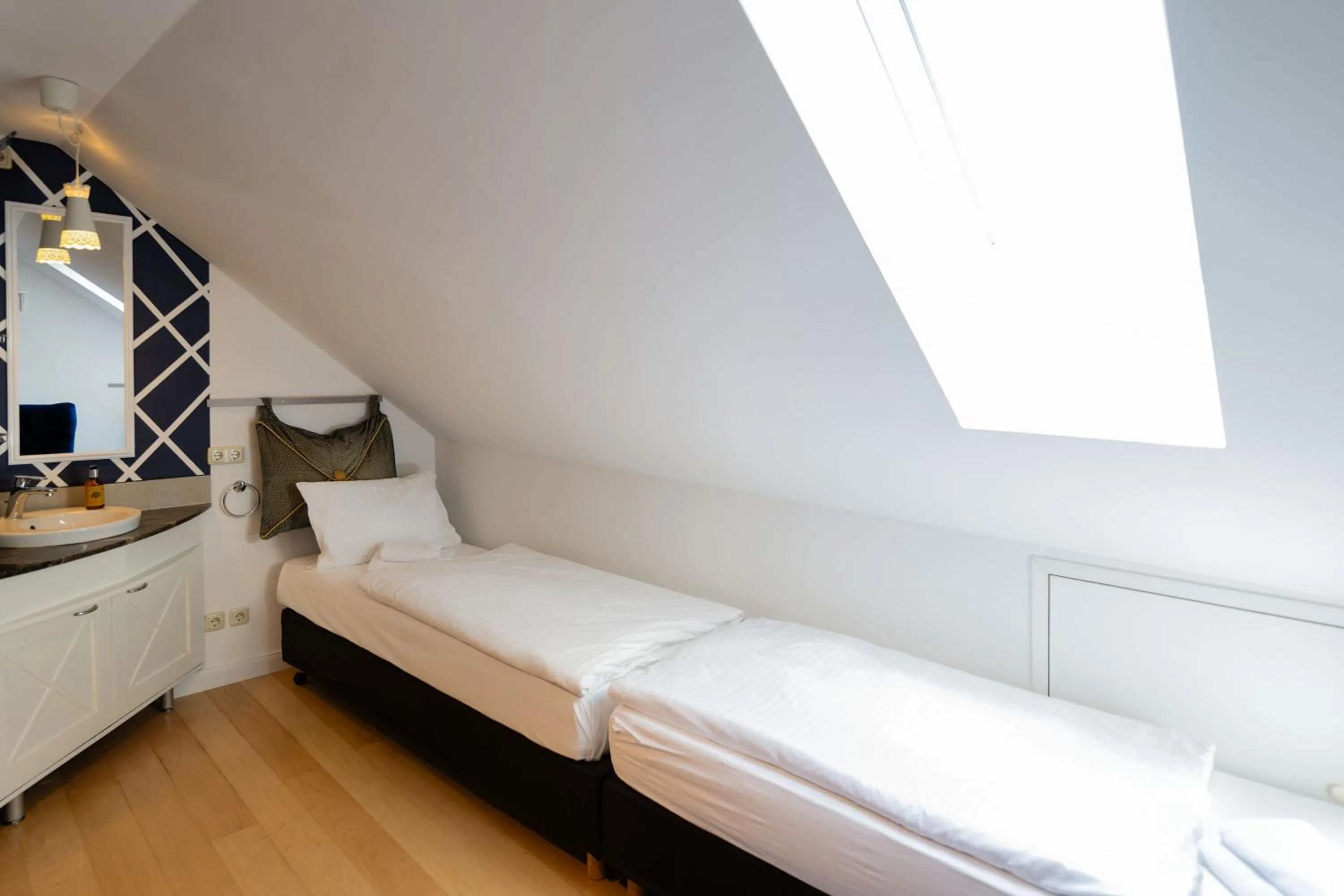 Photo of the whole room, Bed in Rathener Hof by STEIGER Hotels