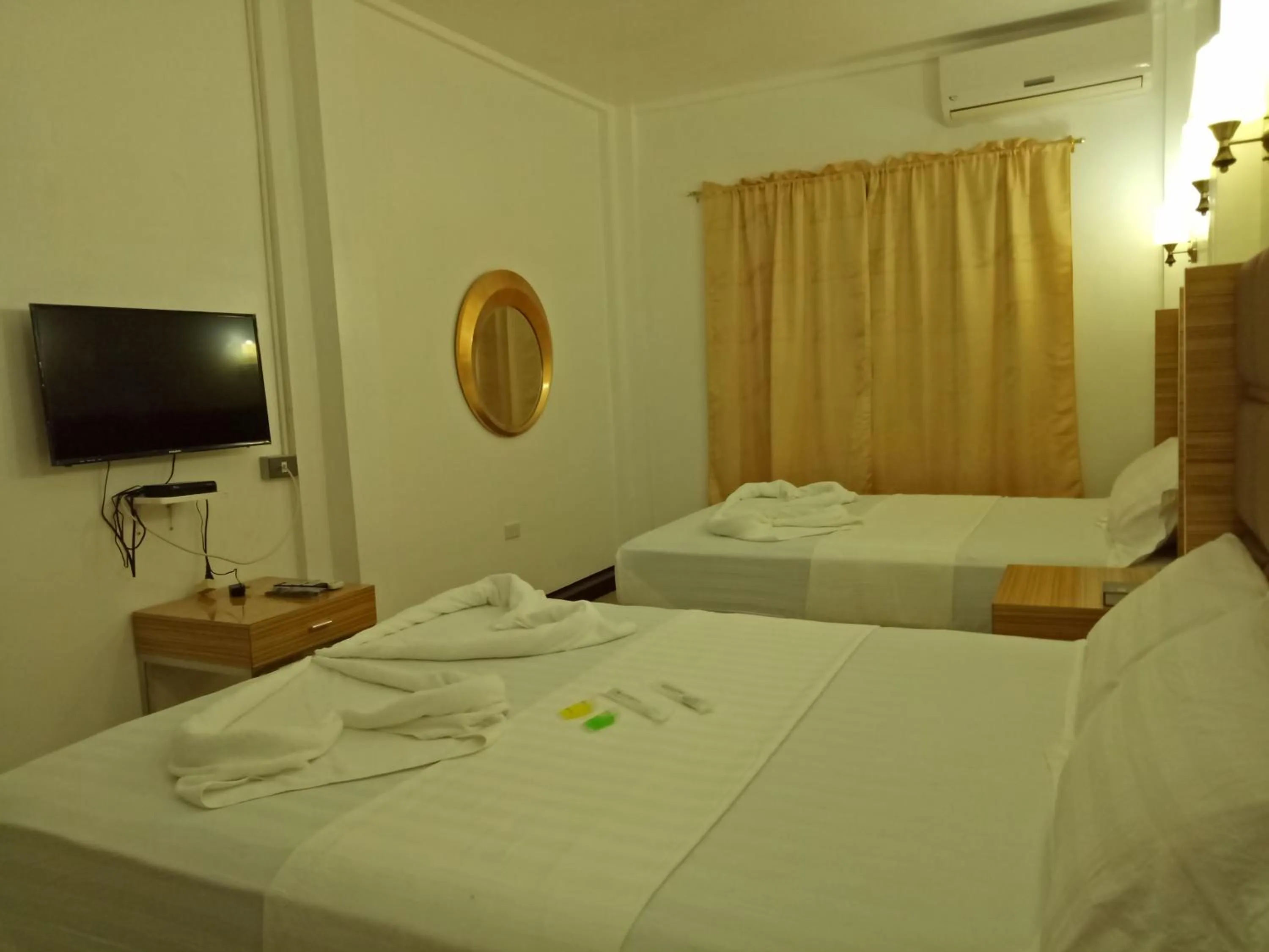 Bed in Meaco Hotel - Anilao