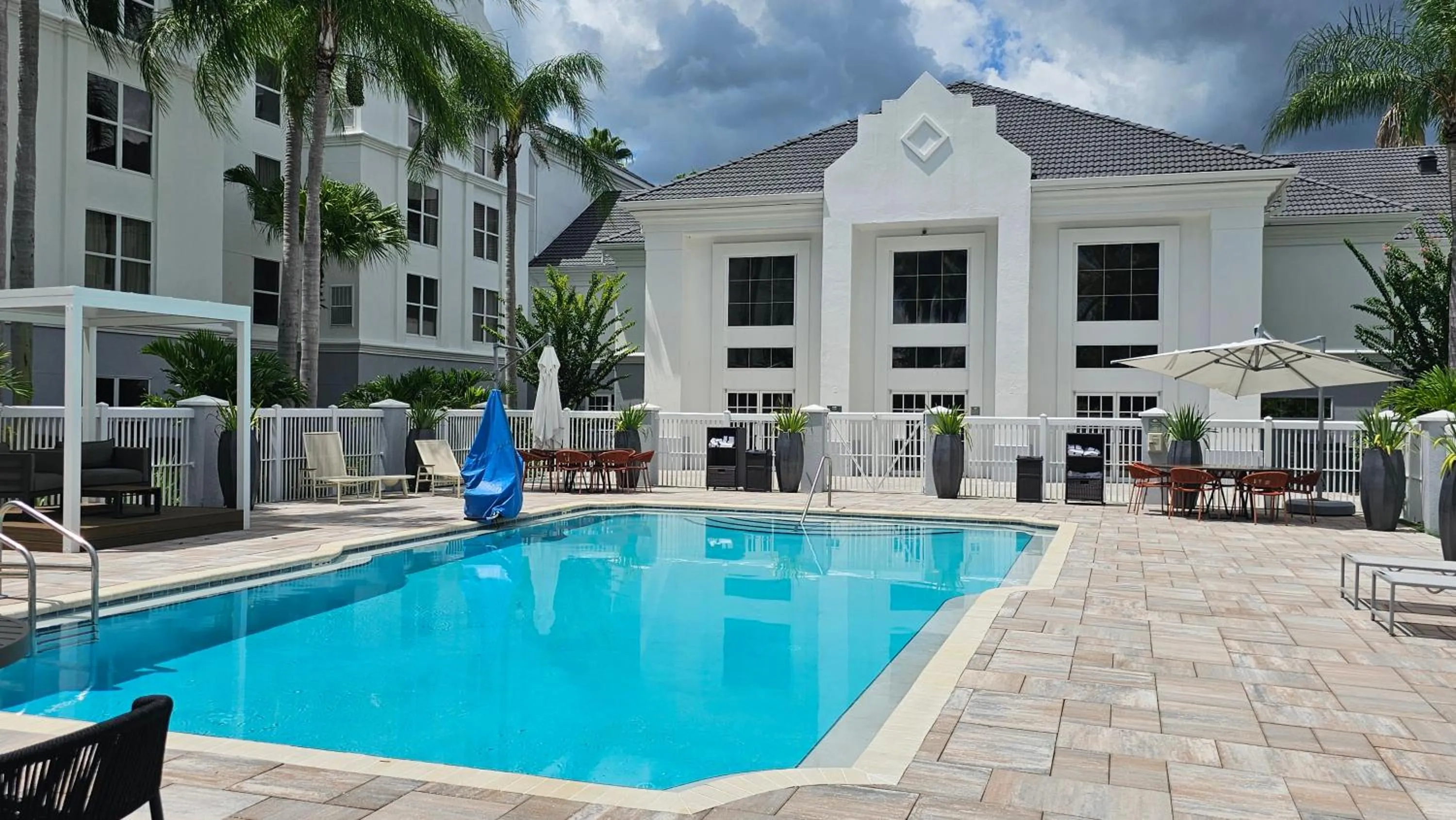 Swimming pool in SureStay Plus by Best Western Orlando Lake Buena Vista