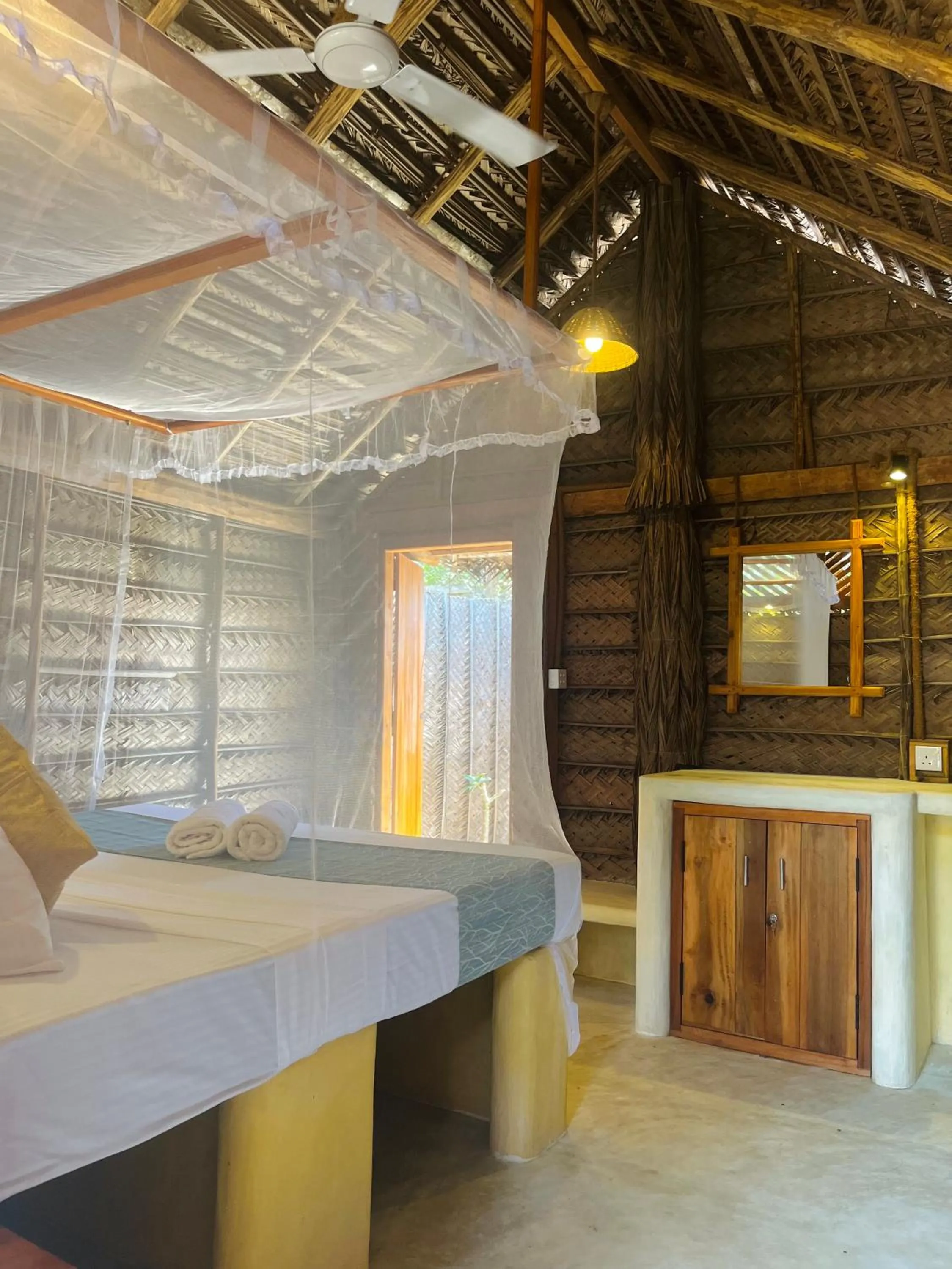 Bed in Windy Waves Beach Nature Resort & Kite School