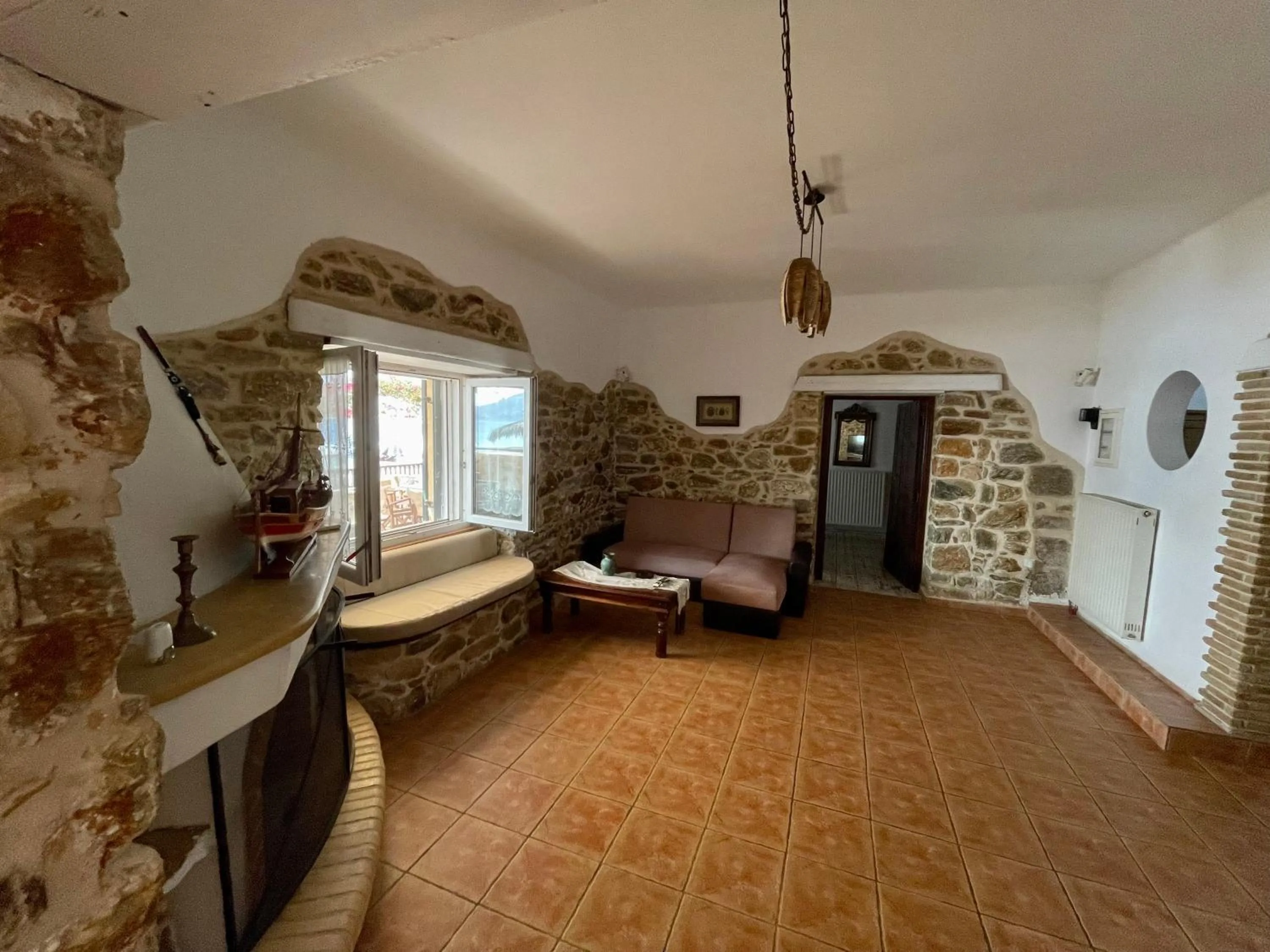 Living room, Bed in Atlazia Suites